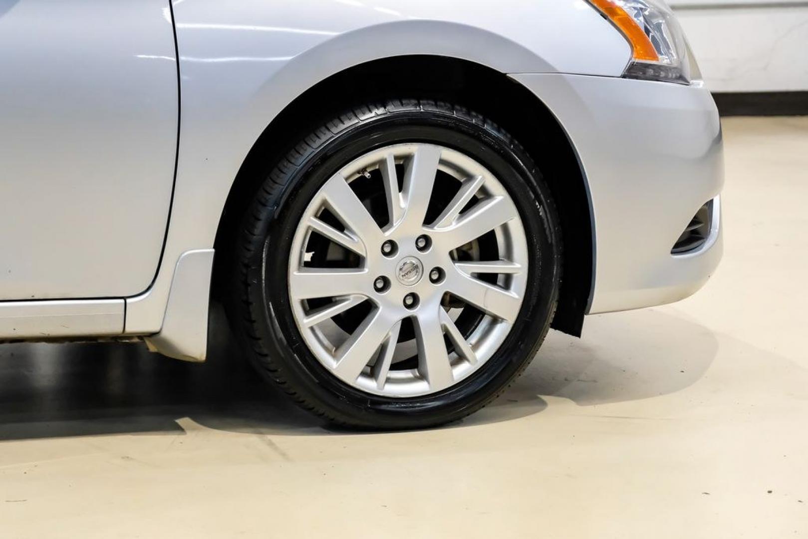 2015 Brilliant Silver /Charcoal Nissan Sentra SL (3N1AB7AP2FY) with an 1.8L 4-Cylinder DOHC 16V engine, CVT transmission, located at 15300 Midway Rd., Addison, TX, 75001, (972) 702-0011, 32.958321, -96.838074- Photo#45