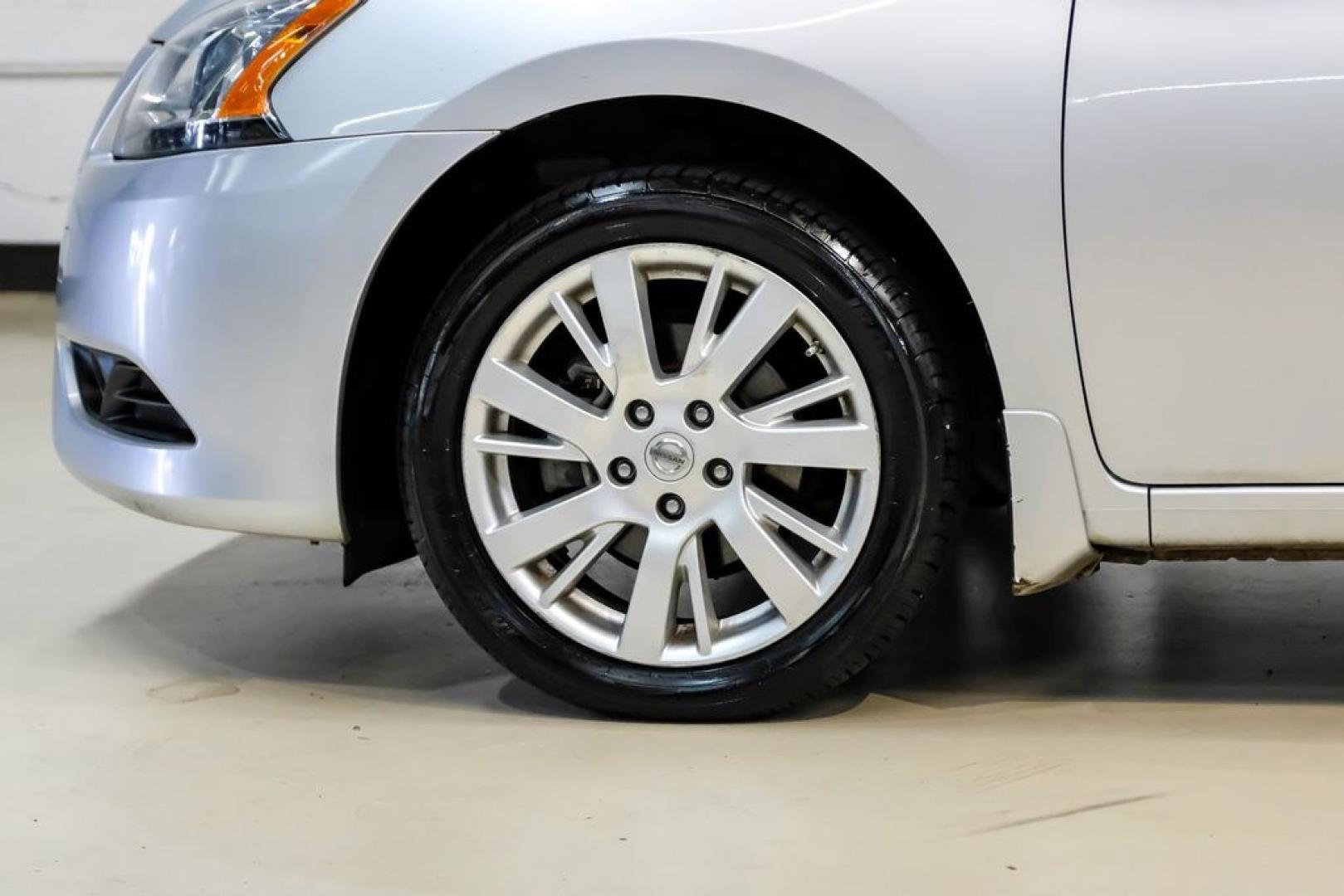 2015 Brilliant Silver /Charcoal Nissan Sentra SL (3N1AB7AP2FY) with an 1.8L 4-Cylinder DOHC 16V engine, CVT transmission, located at 15300 Midway Rd., Addison, TX, 75001, (972) 702-0011, 32.958321, -96.838074- Photo#46