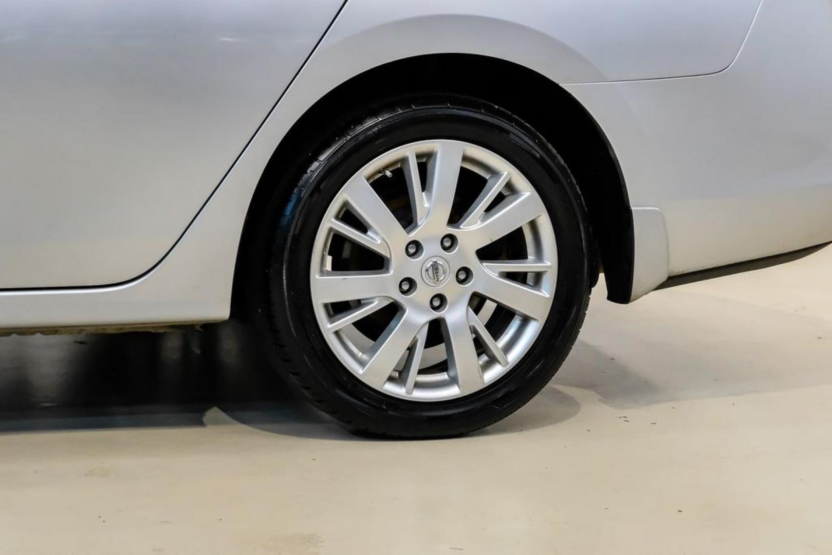 2015 Brilliant Silver /Charcoal Nissan Sentra SL (3N1AB7AP2FY) with an 1.8L 4-Cylinder DOHC 16V engine, CVT transmission, located at 15300 Midway Rd., Addison, TX, 75001, (972) 702-0011, 32.958321, -96.838074- Photo#47
