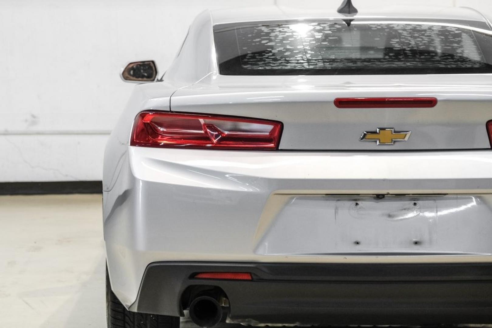 2018 Silver Ice Metallic /Jet Black Chevrolet Camaro 1LS (1G1FA1RX7J0) with an 2.0L Turbocharged engine, Manual transmission, located at 15300 Midway Rd., Addison, TX, 75001, (972) 702-0011, 32.958321, -96.838074- Photo#38