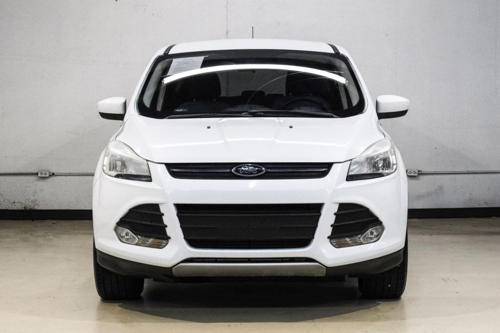 2015 Oxford White /Black Ford Escape SE (1FMCU9G91FU) with an EcoBoost 2.0L I4 GTDi DOHC Turbocharged VCT engine, Automatic transmission, located at 15300 Midway Rd., Addison, TX, 75001, (972) 702-0011, 32.958321, -96.838074- Photo#6
