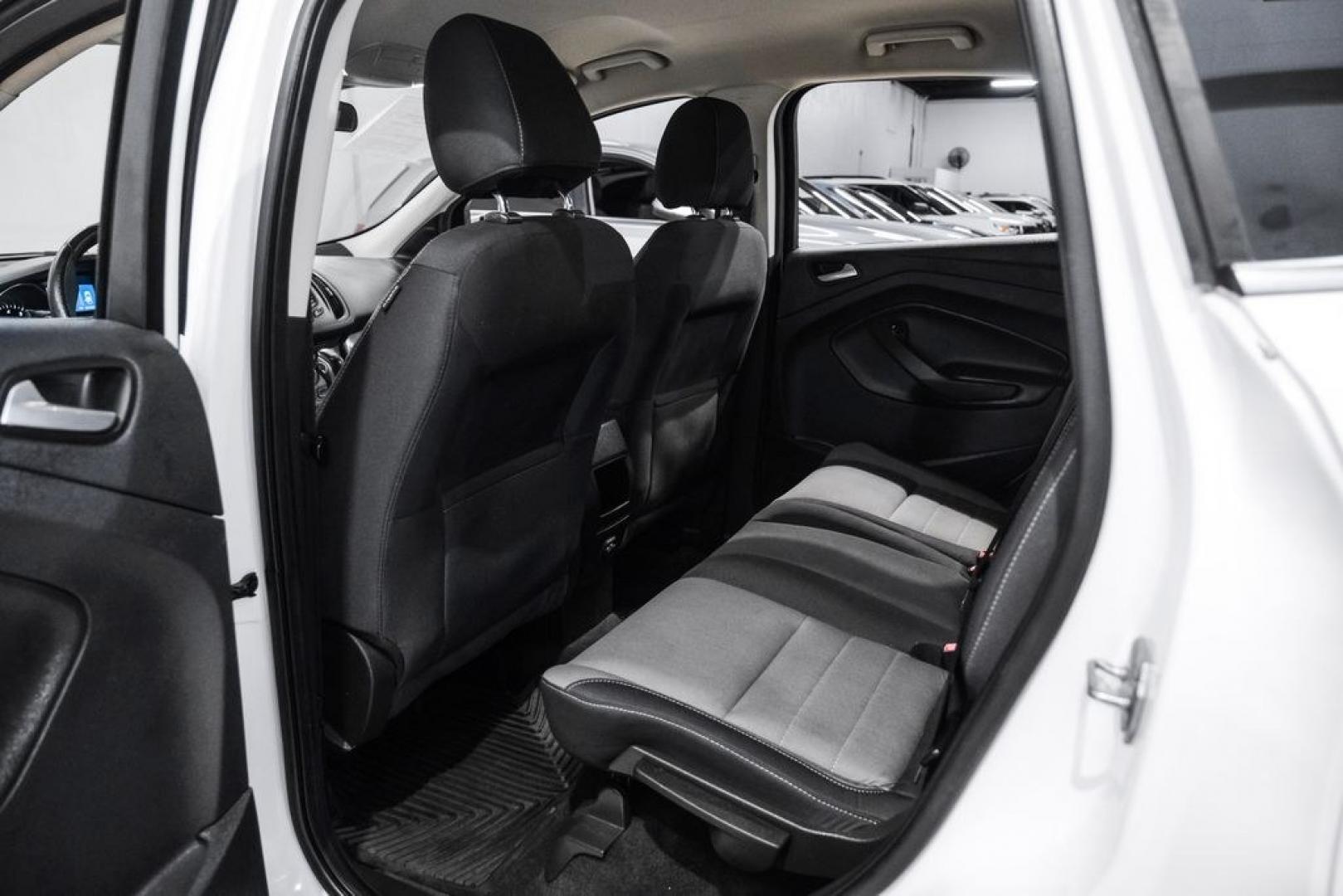 2015 Oxford White /Black Ford Escape SE (1FMCU9G91FU) with an EcoBoost 2.0L I4 GTDi DOHC Turbocharged VCT engine, Automatic transmission, located at 15300 Midway Rd., Addison, TX, 75001, (972) 702-0011, 32.958321, -96.838074- Photo#37