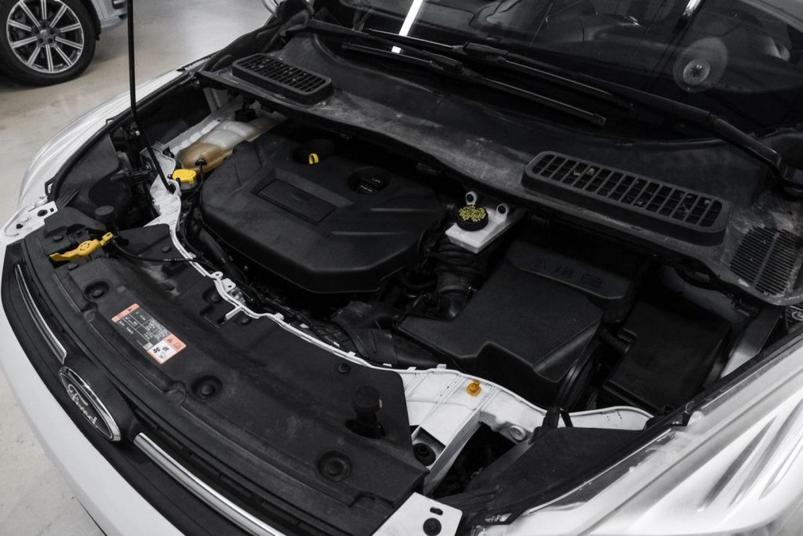 2015 Oxford White /Black Ford Escape SE (1FMCU9G91FU) with an EcoBoost 2.0L I4 GTDi DOHC Turbocharged VCT engine, Automatic transmission, located at 15300 Midway Rd., Addison, TX, 75001, (972) 702-0011, 32.958321, -96.838074- Photo#48