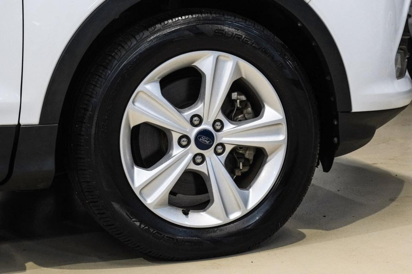 2015 Oxford White /Black Ford Escape SE (1FMCU9G91FU) with an EcoBoost 2.0L I4 GTDi DOHC Turbocharged VCT engine, Automatic transmission, located at 15300 Midway Rd., Addison, TX, 75001, (972) 702-0011, 32.958321, -96.838074- Photo#56