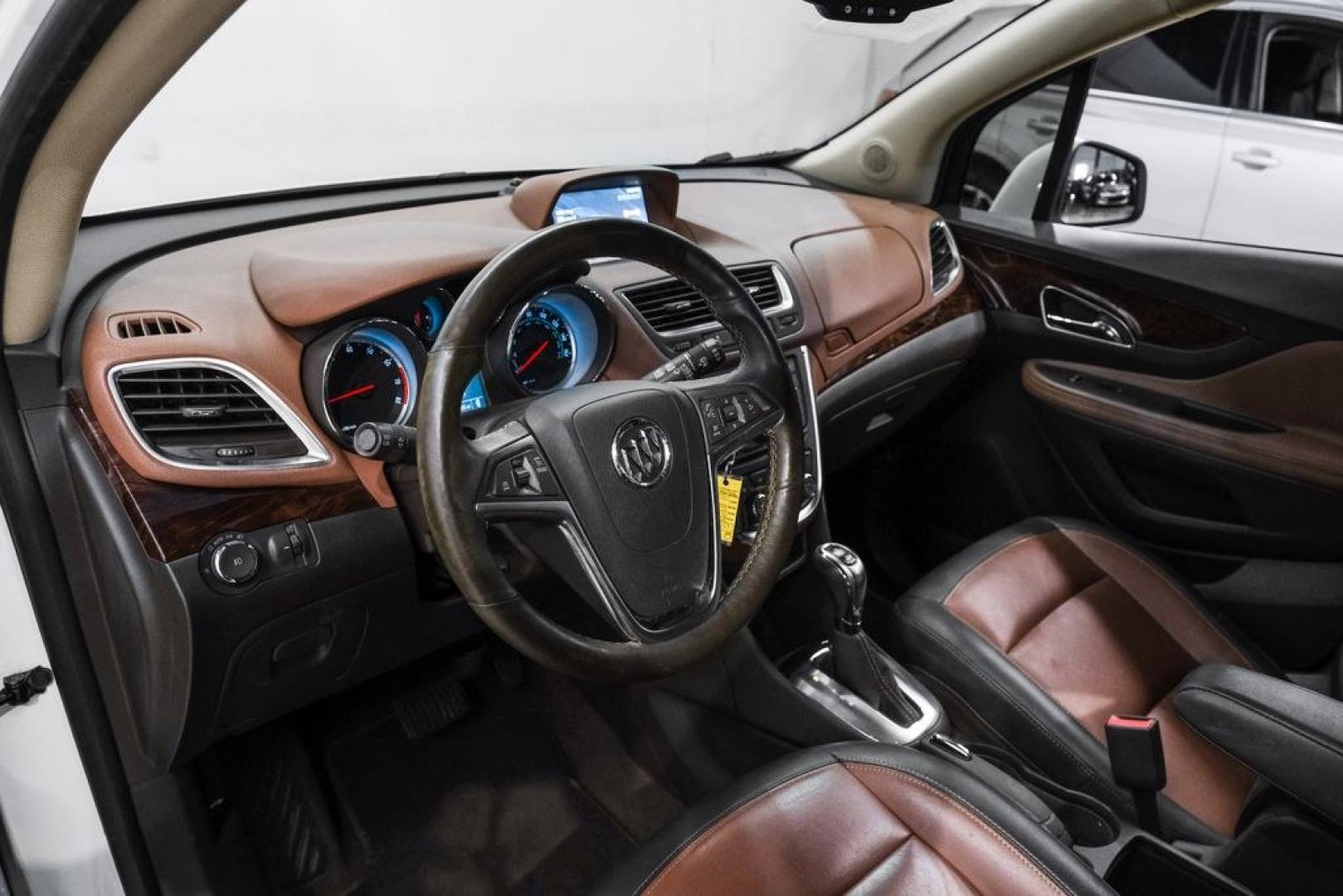 2016 Summit White /Saddle Buick Encore Leather (KL4CJCSBXGB) with an ECOTEC 1.4L I4 SMPI DOHC Turbocharged VVT engine, Automatic transmission, located at 15300 Midway Rd., Addison, TX, 75001, (972) 702-0011, 32.958321, -96.838074- Photo#2