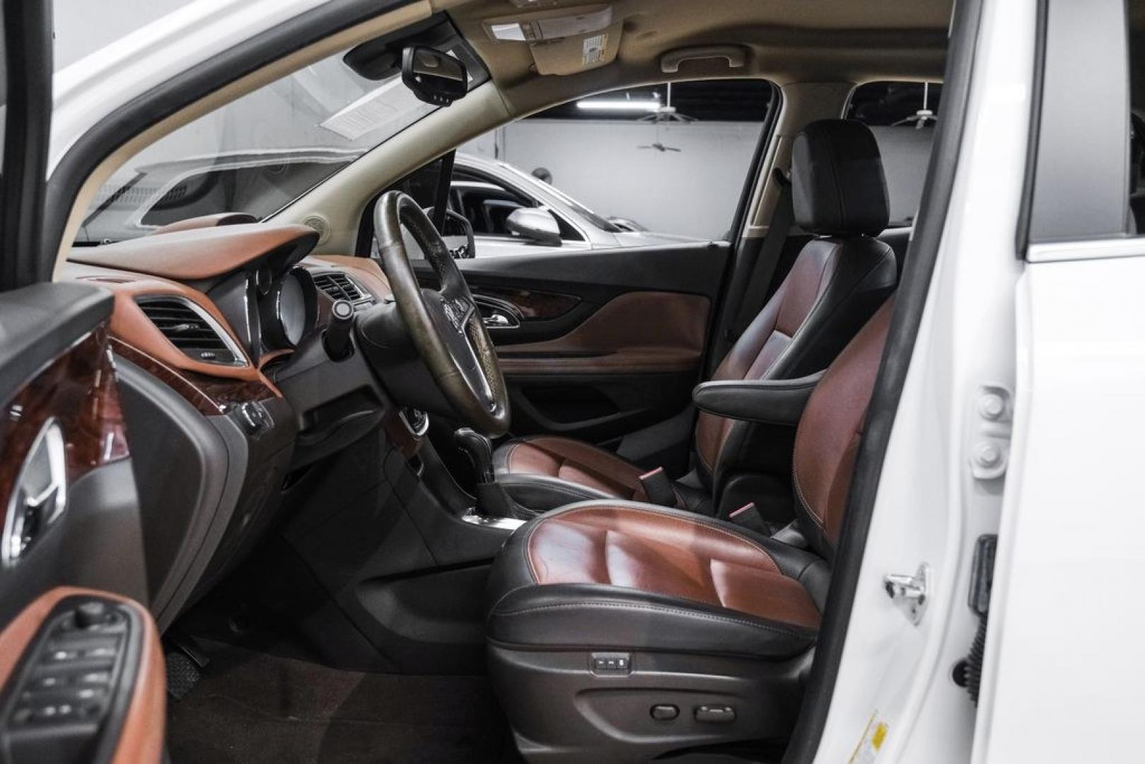 2016 Summit White /Saddle Buick Encore Leather (KL4CJCSBXGB) with an ECOTEC 1.4L I4 SMPI DOHC Turbocharged VVT engine, Automatic transmission, located at 15300 Midway Rd., Addison, TX, 75001, (972) 702-0011, 32.958321, -96.838074- Photo#3