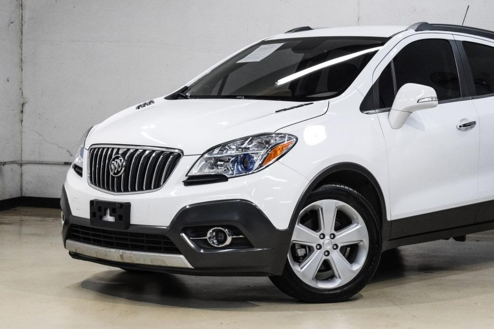2016 Summit White /Saddle Buick Encore Leather (KL4CJCSBXGB) with an ECOTEC 1.4L I4 SMPI DOHC Turbocharged VVT engine, Automatic transmission, located at 15300 Midway Rd., Addison, TX, 75001, (972) 702-0011, 32.958321, -96.838074- Photo#4