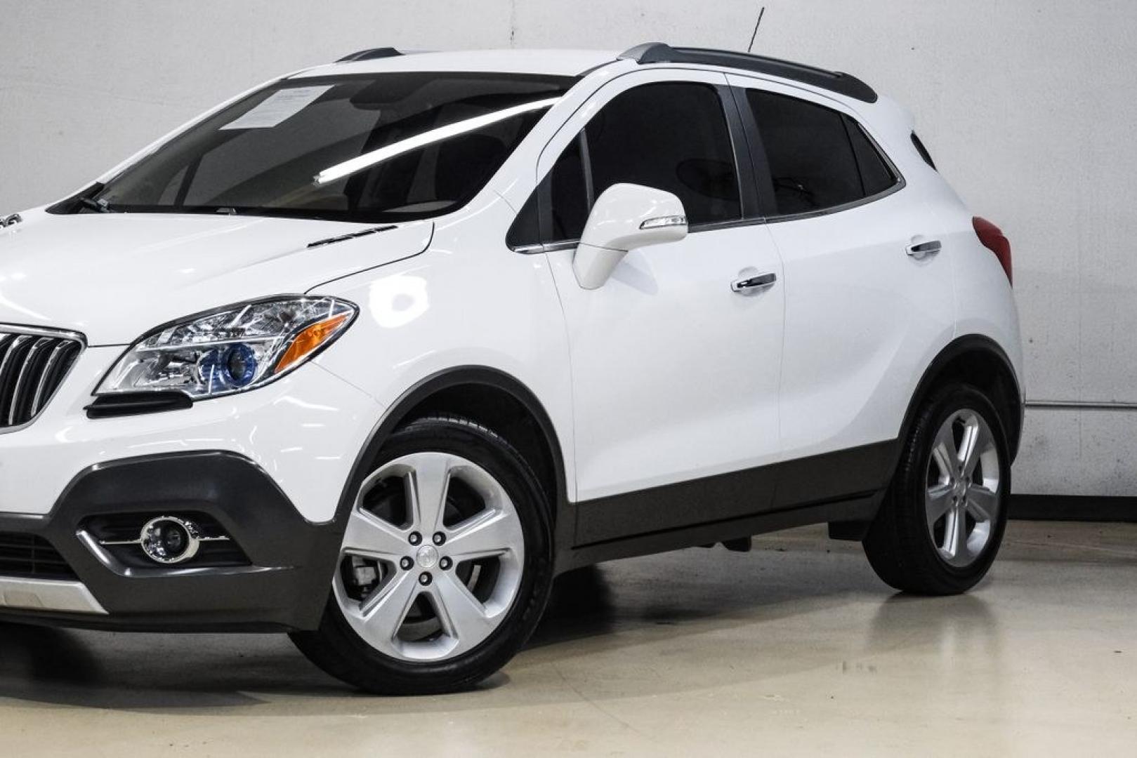 2016 Summit White /Saddle Buick Encore Leather (KL4CJCSBXGB) with an ECOTEC 1.4L I4 SMPI DOHC Turbocharged VVT engine, Automatic transmission, located at 15300 Midway Rd., Addison, TX, 75001, (972) 702-0011, 32.958321, -96.838074- Photo#5