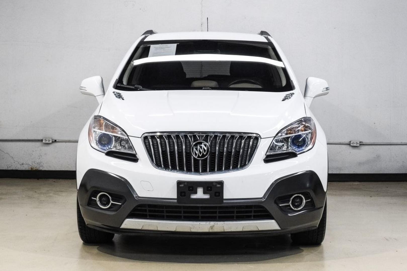 2016 Summit White /Saddle Buick Encore Leather (KL4CJCSBXGB) with an ECOTEC 1.4L I4 SMPI DOHC Turbocharged VVT engine, Automatic transmission, located at 15300 Midway Rd., Addison, TX, 75001, (972) 702-0011, 32.958321, -96.838074- Photo#6