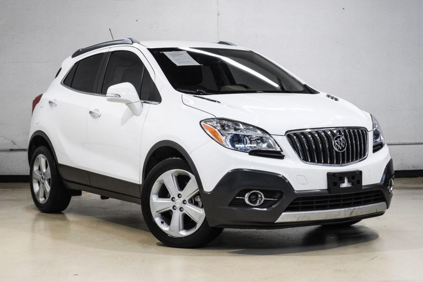 2016 Summit White /Saddle Buick Encore Leather (KL4CJCSBXGB) with an ECOTEC 1.4L I4 SMPI DOHC Turbocharged VVT engine, Automatic transmission, located at 15300 Midway Rd., Addison, TX, 75001, (972) 702-0011, 32.958321, -96.838074- Photo#7