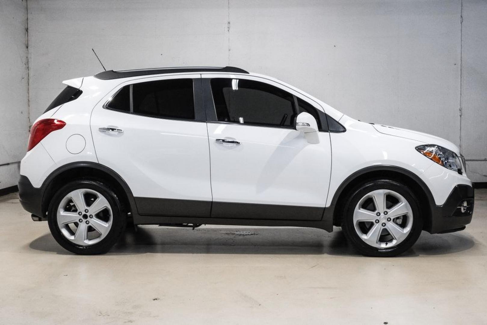 2016 Summit White /Saddle Buick Encore Leather (KL4CJCSBXGB) with an ECOTEC 1.4L I4 SMPI DOHC Turbocharged VVT engine, Automatic transmission, located at 15300 Midway Rd., Addison, TX, 75001, (972) 702-0011, 32.958321, -96.838074- Photo#8
