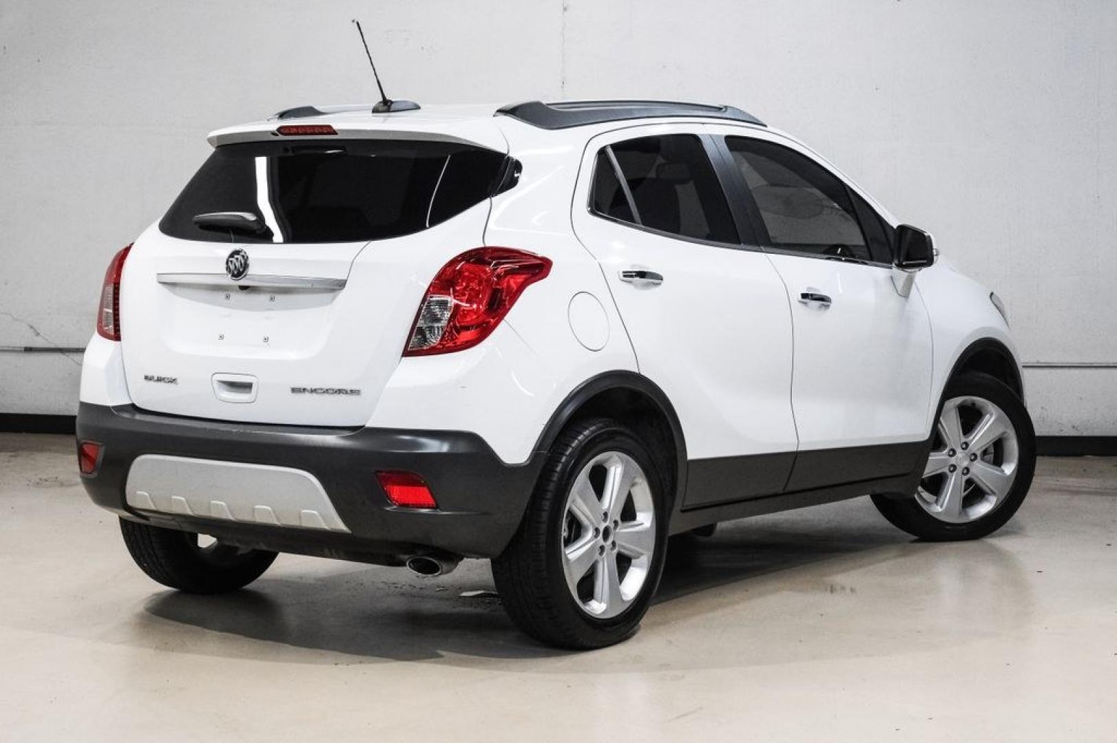 2016 Summit White /Saddle Buick Encore Leather (KL4CJCSBXGB) with an ECOTEC 1.4L I4 SMPI DOHC Turbocharged VVT engine, Automatic transmission, located at 15300 Midway Rd., Addison, TX, 75001, (972) 702-0011, 32.958321, -96.838074- Photo#9