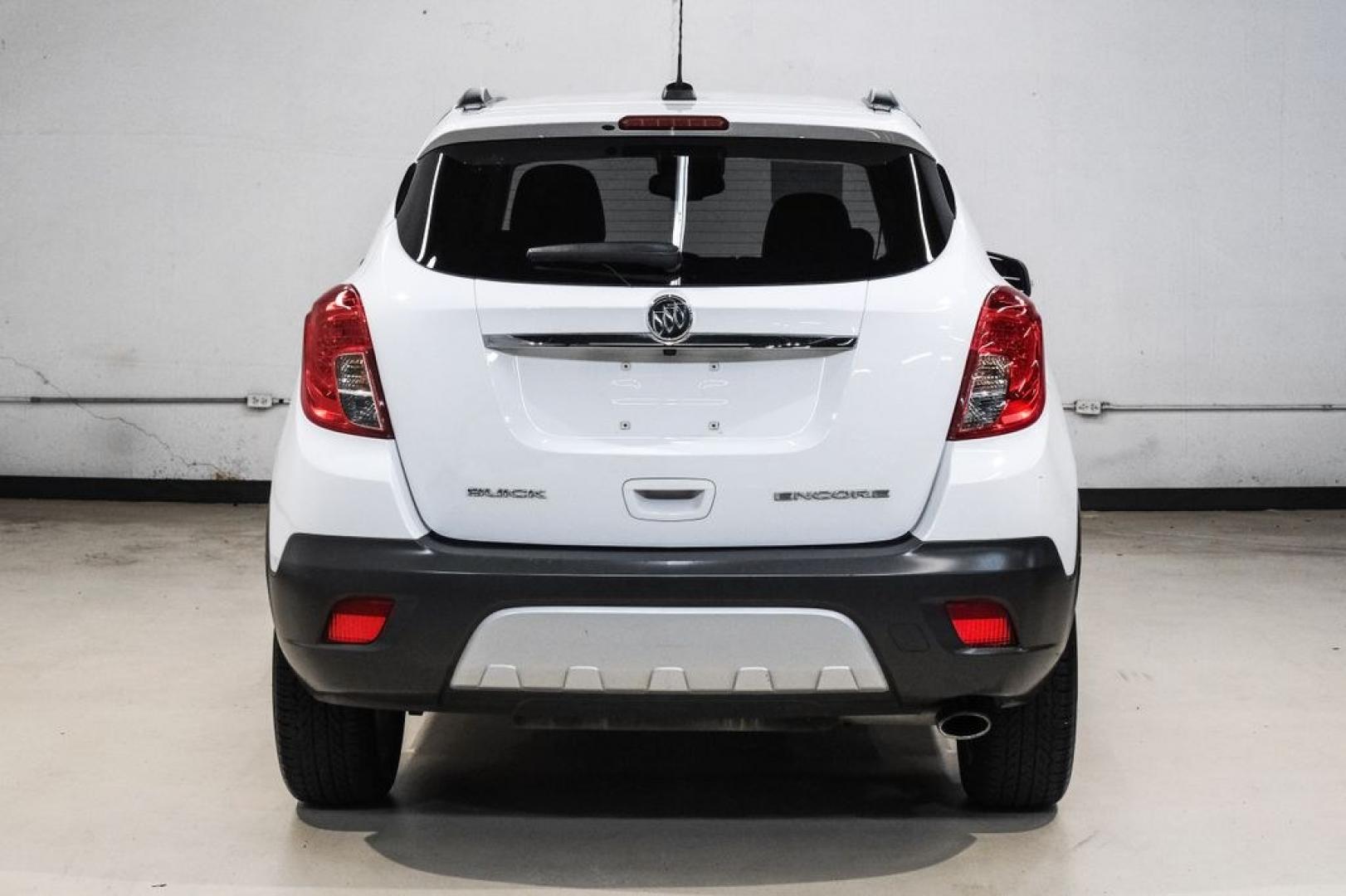 2016 Summit White /Saddle Buick Encore Leather (KL4CJCSBXGB) with an ECOTEC 1.4L I4 SMPI DOHC Turbocharged VVT engine, Automatic transmission, located at 15300 Midway Rd., Addison, TX, 75001, (972) 702-0011, 32.958321, -96.838074- Photo#10