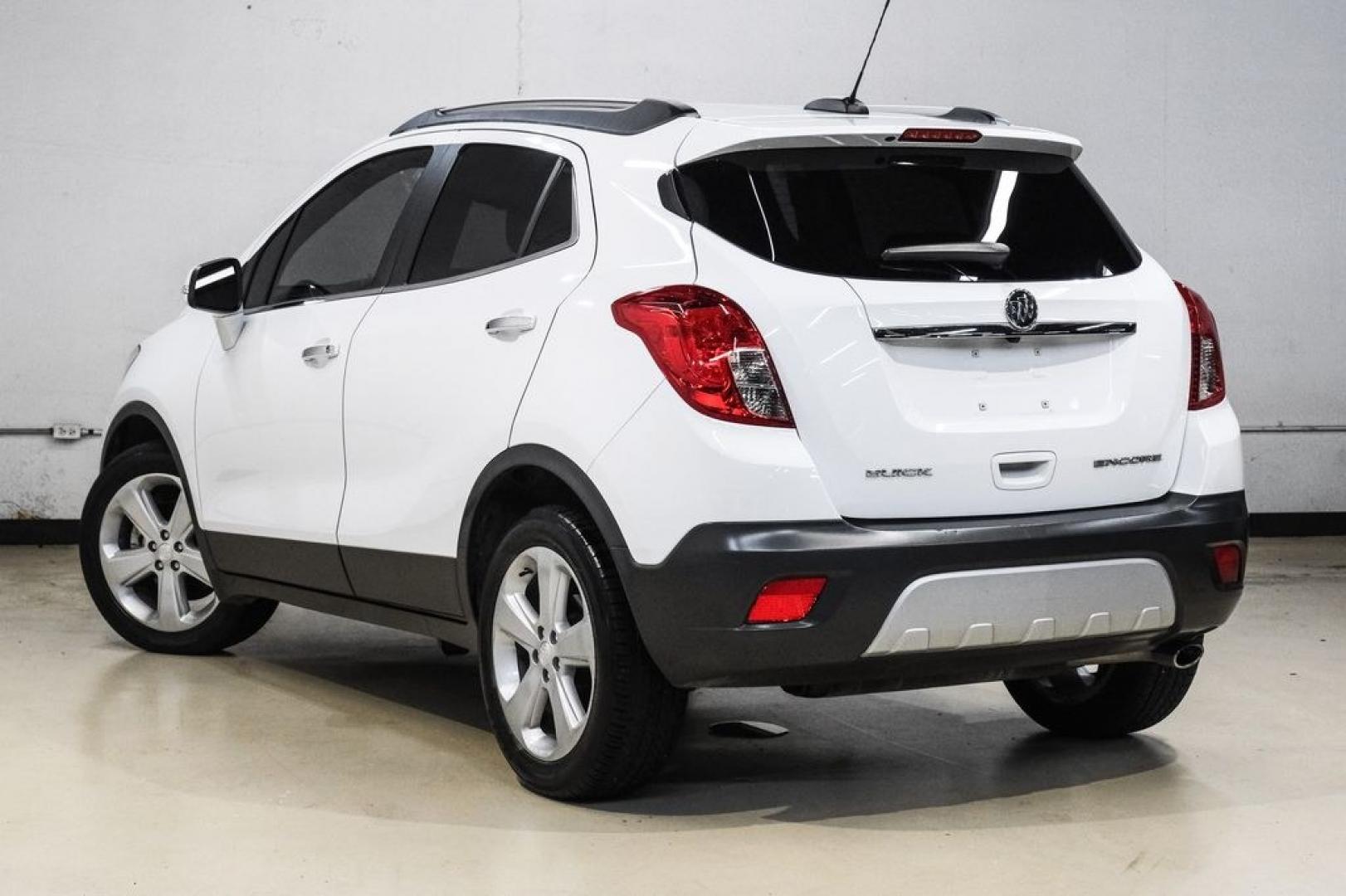 2016 Summit White /Saddle Buick Encore Leather (KL4CJCSBXGB) with an ECOTEC 1.4L I4 SMPI DOHC Turbocharged VVT engine, Automatic transmission, located at 15300 Midway Rd., Addison, TX, 75001, (972) 702-0011, 32.958321, -96.838074- Photo#11