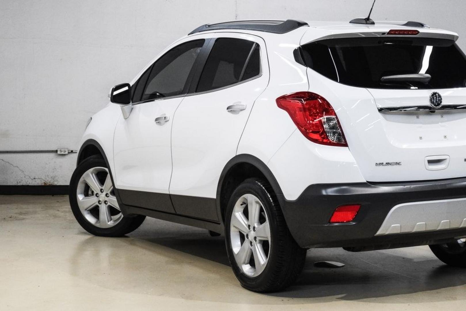 2016 Summit White /Saddle Buick Encore Leather (KL4CJCSBXGB) with an ECOTEC 1.4L I4 SMPI DOHC Turbocharged VVT engine, Automatic transmission, located at 15300 Midway Rd., Addison, TX, 75001, (972) 702-0011, 32.958321, -96.838074- Photo#12