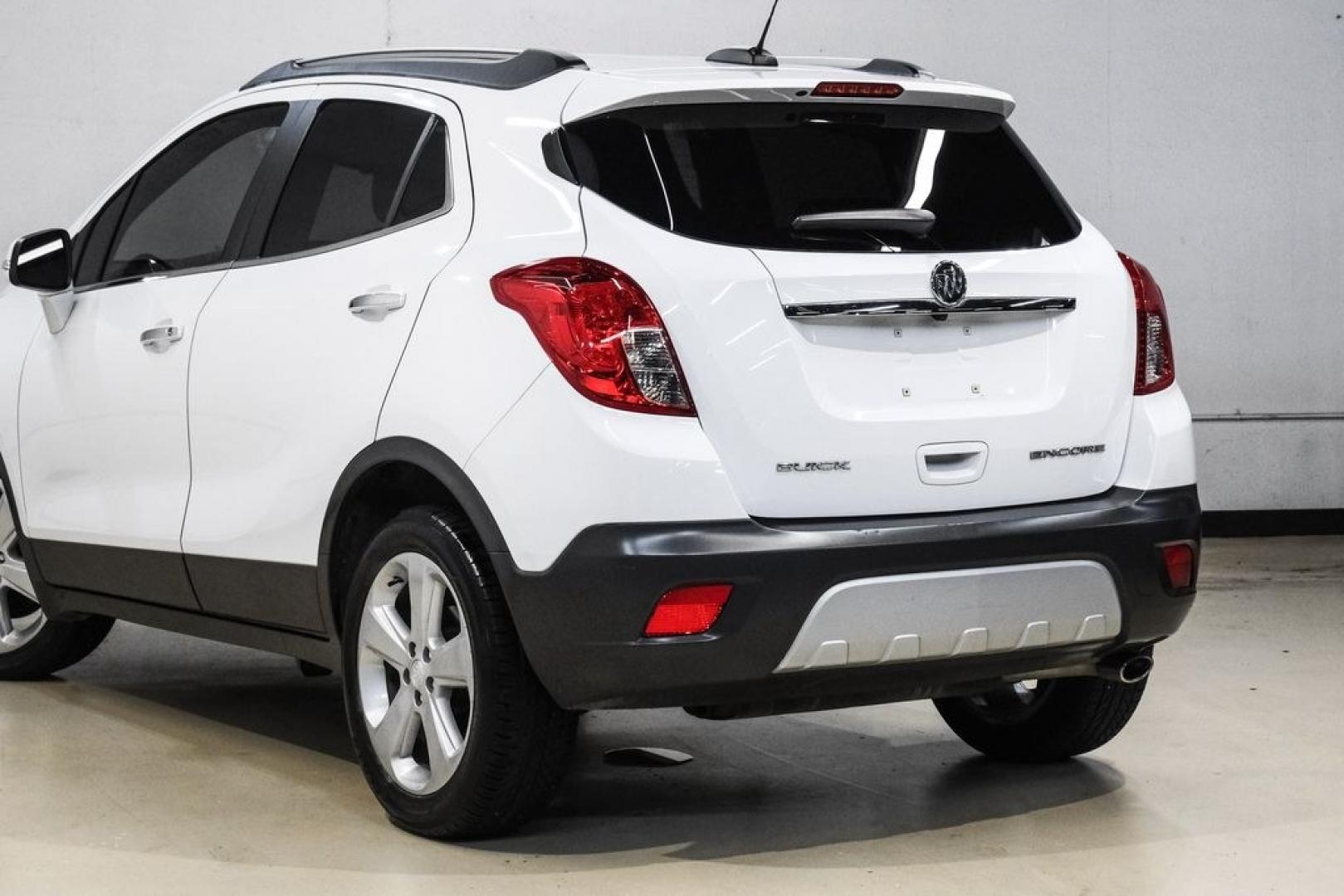 2016 Summit White /Saddle Buick Encore Leather (KL4CJCSBXGB) with an ECOTEC 1.4L I4 SMPI DOHC Turbocharged VVT engine, Automatic transmission, located at 15300 Midway Rd., Addison, TX, 75001, (972) 702-0011, 32.958321, -96.838074- Photo#13