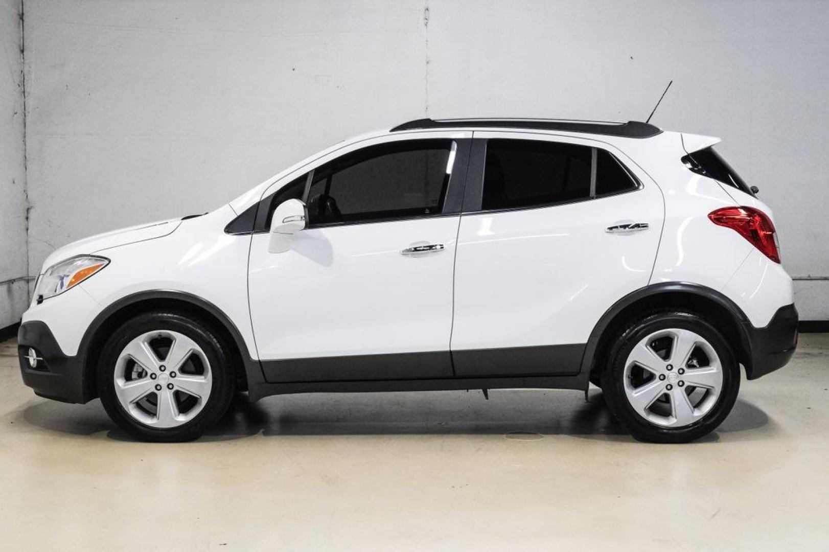 2016 Summit White /Saddle Buick Encore Leather (KL4CJCSBXGB) with an ECOTEC 1.4L I4 SMPI DOHC Turbocharged VVT engine, Automatic transmission, located at 15300 Midway Rd., Addison, TX, 75001, (972) 702-0011, 32.958321, -96.838074- Photo#14