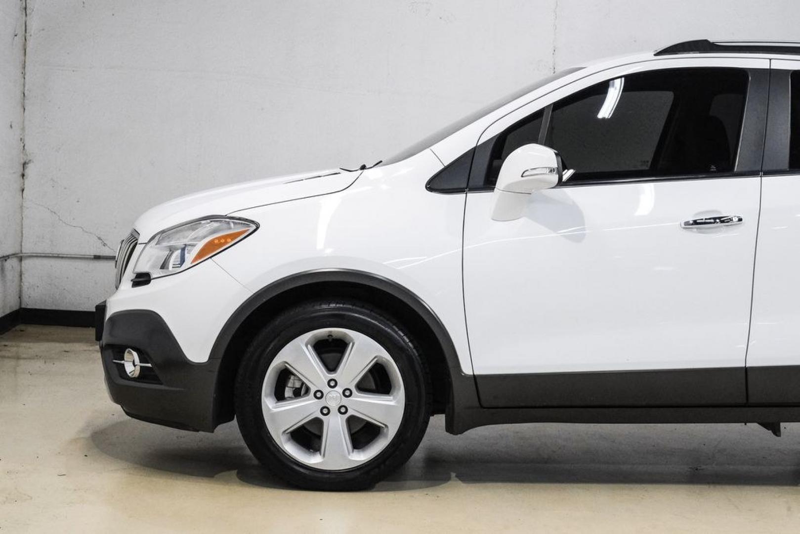2016 Summit White /Saddle Buick Encore Leather (KL4CJCSBXGB) with an ECOTEC 1.4L I4 SMPI DOHC Turbocharged VVT engine, Automatic transmission, located at 15300 Midway Rd., Addison, TX, 75001, (972) 702-0011, 32.958321, -96.838074- Photo#15