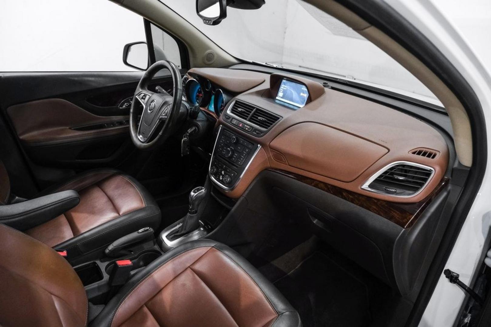 2016 Summit White /Saddle Buick Encore Leather (KL4CJCSBXGB) with an ECOTEC 1.4L I4 SMPI DOHC Turbocharged VVT engine, Automatic transmission, located at 15300 Midway Rd., Addison, TX, 75001, (972) 702-0011, 32.958321, -96.838074- Photo#17