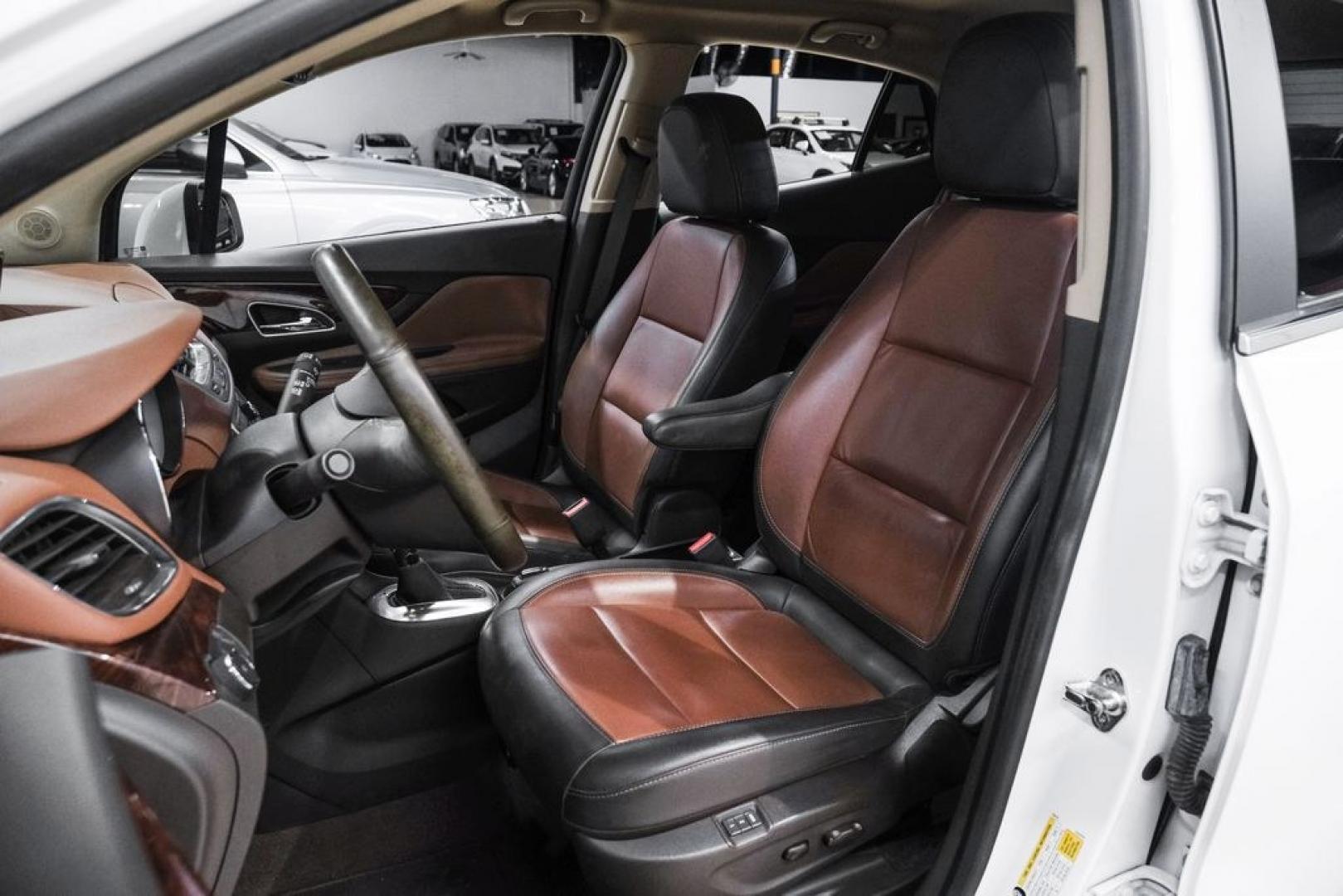 2016 Summit White /Saddle Buick Encore Leather (KL4CJCSBXGB) with an ECOTEC 1.4L I4 SMPI DOHC Turbocharged VVT engine, Automatic transmission, located at 15300 Midway Rd., Addison, TX, 75001, (972) 702-0011, 32.958321, -96.838074- Photo#32