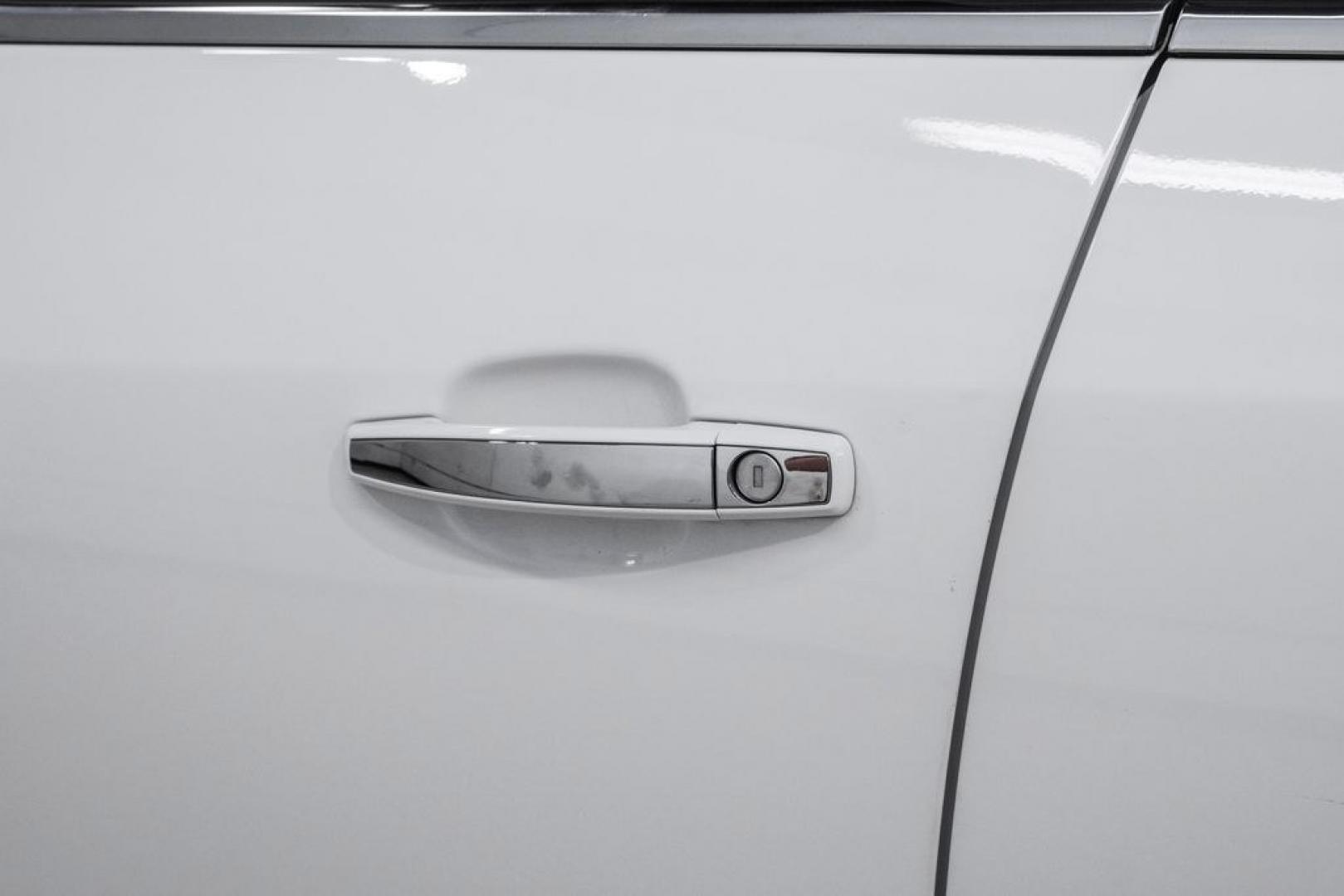 2016 Summit White /Saddle Buick Encore Leather (KL4CJCSBXGB) with an ECOTEC 1.4L I4 SMPI DOHC Turbocharged VVT engine, Automatic transmission, located at 15300 Midway Rd., Addison, TX, 75001, (972) 702-0011, 32.958321, -96.838074- Photo#40