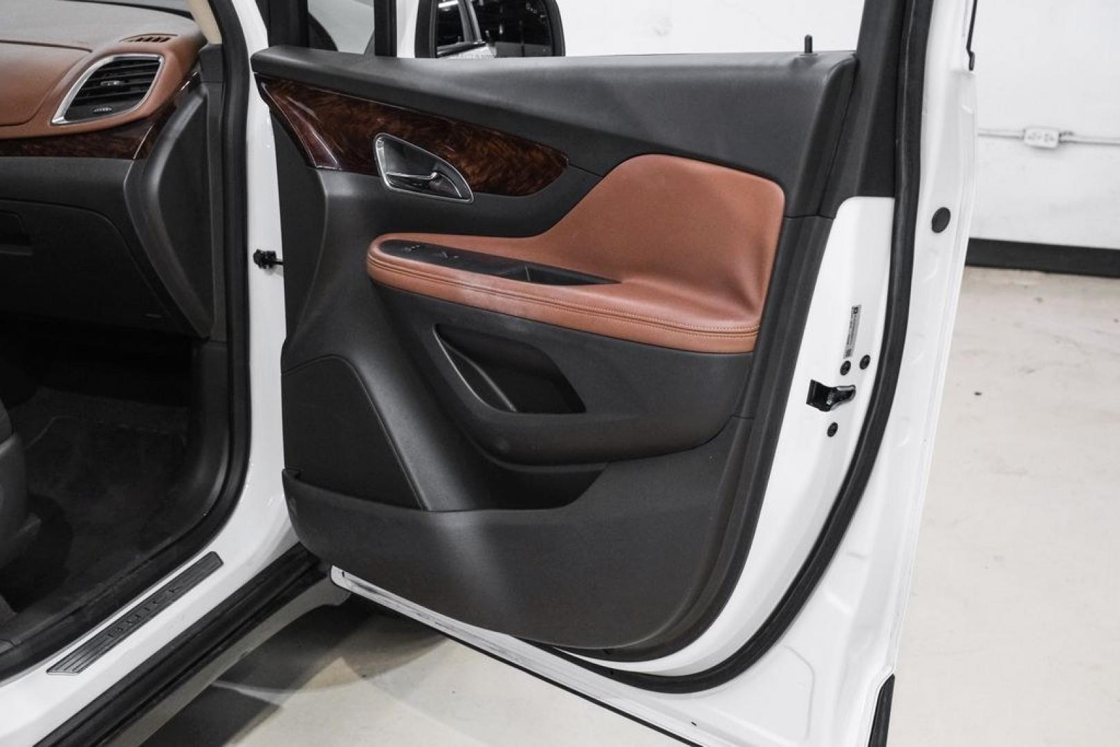 2016 Summit White /Saddle Buick Encore Leather (KL4CJCSBXGB) with an ECOTEC 1.4L I4 SMPI DOHC Turbocharged VVT engine, Automatic transmission, located at 15300 Midway Rd., Addison, TX, 75001, (972) 702-0011, 32.958321, -96.838074- Photo#44