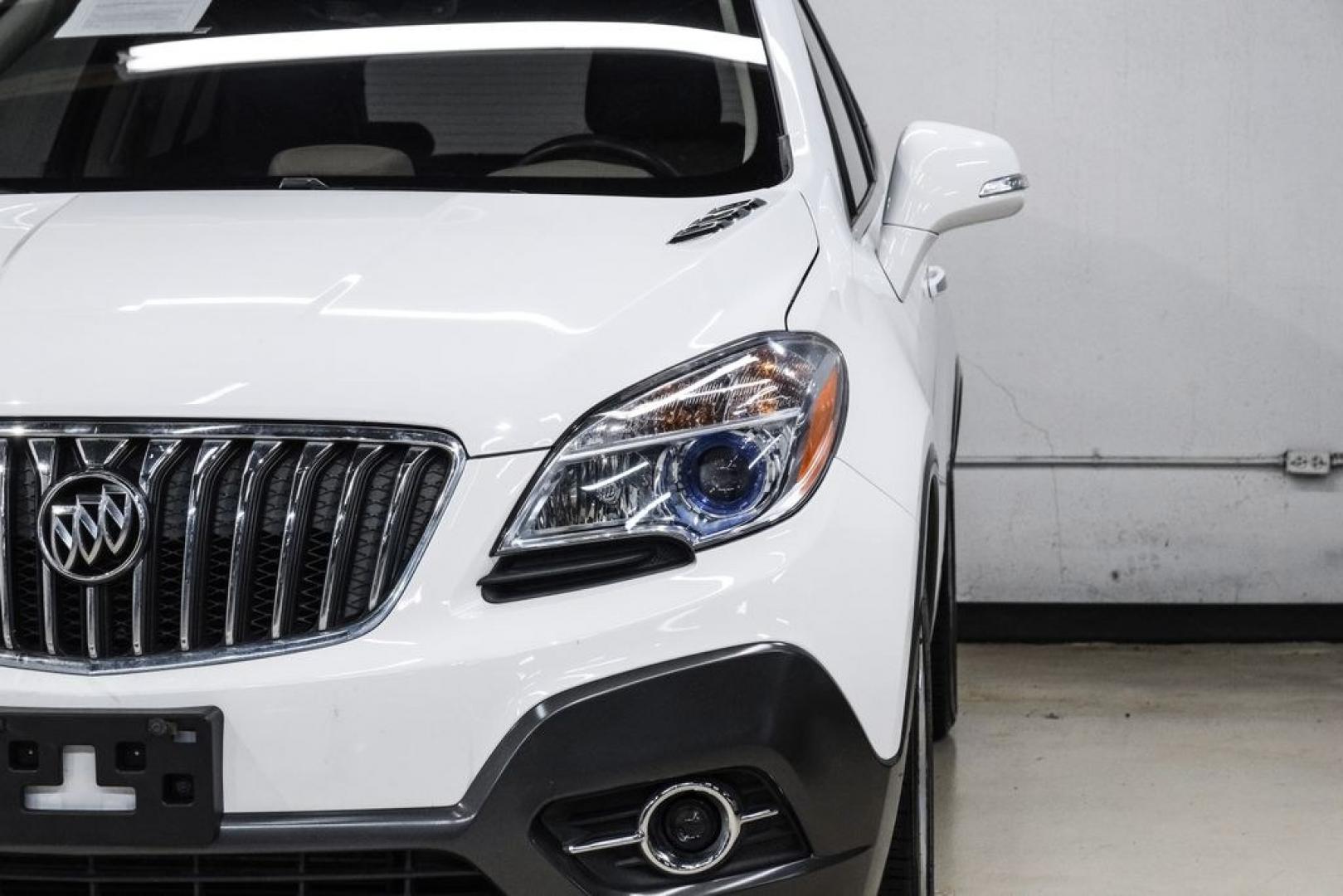 2016 Summit White /Saddle Buick Encore Leather (KL4CJCSBXGB) with an ECOTEC 1.4L I4 SMPI DOHC Turbocharged VVT engine, Automatic transmission, located at 15300 Midway Rd., Addison, TX, 75001, (972) 702-0011, 32.958321, -96.838074- Photo#47