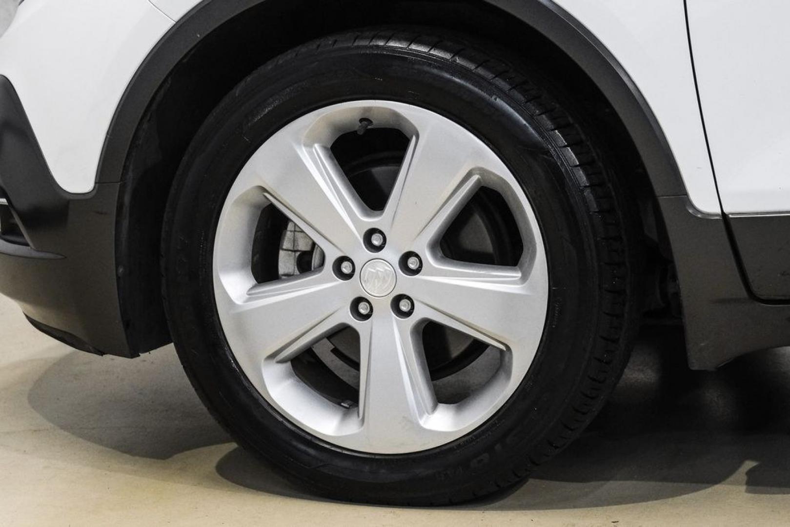 2016 Summit White /Saddle Buick Encore Leather (KL4CJCSBXGB) with an ECOTEC 1.4L I4 SMPI DOHC Turbocharged VVT engine, Automatic transmission, located at 15300 Midway Rd., Addison, TX, 75001, (972) 702-0011, 32.958321, -96.838074- Photo#54