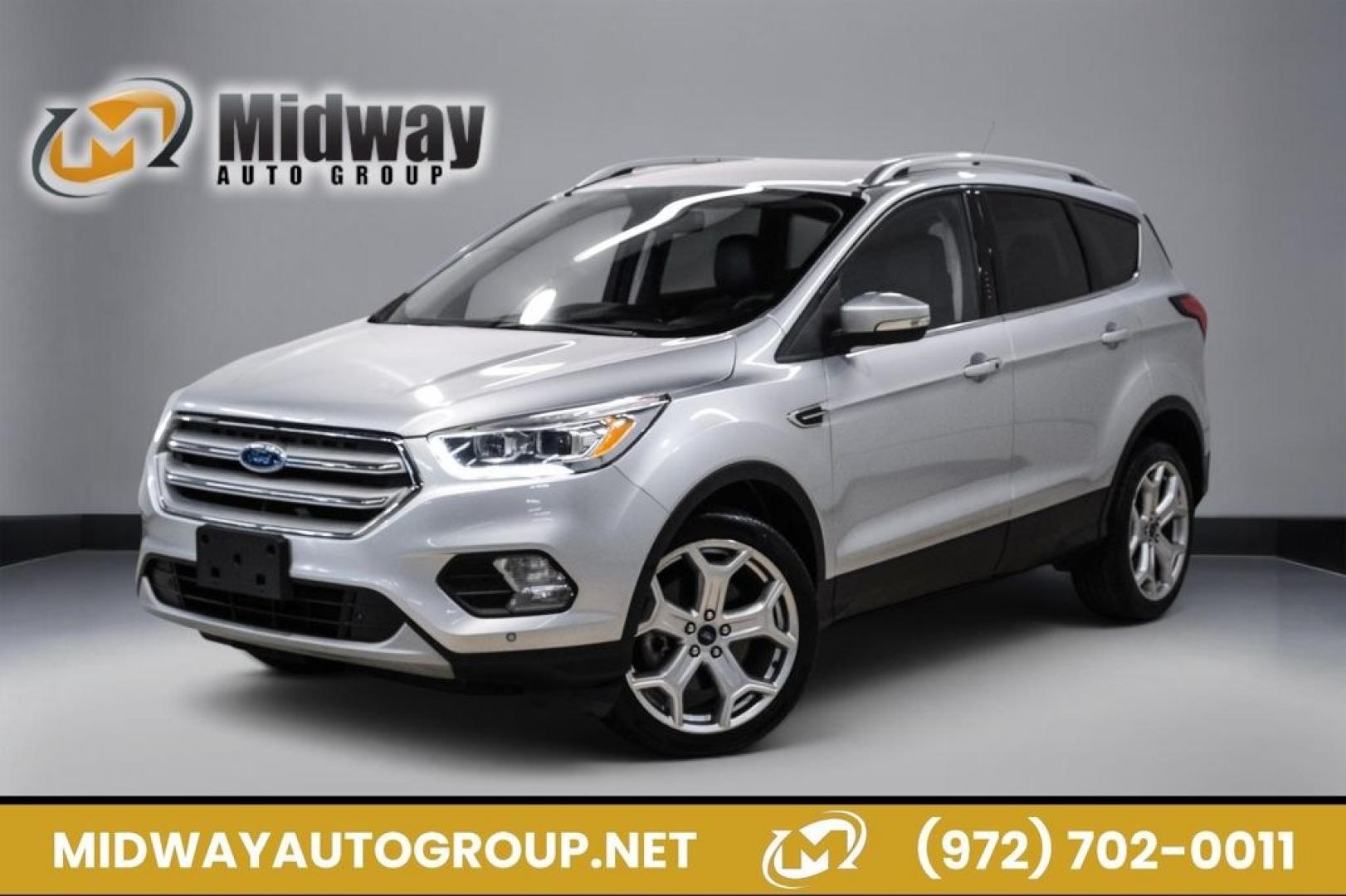 2019 Ingot Silver /Black Ford Escape Titanium (1FMCU9J93KU) with an EcoBoost 2.0L I4 GTDi DOHC Turbocharged VCT engine, Automatic transmission, located at 15300 Midway Rd., Addison, TX, 75001, (972) 702-0011, 32.958321, -96.838074- Photo#0