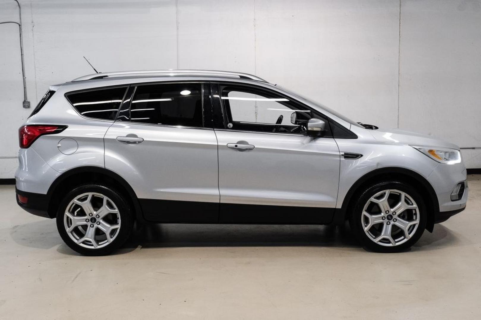 2019 Ingot Silver /Black Ford Escape Titanium (1FMCU9J93KU) with an EcoBoost 2.0L I4 GTDi DOHC Turbocharged VCT engine, Automatic transmission, located at 15300 Midway Rd., Addison, TX, 75001, (972) 702-0011, 32.958321, -96.838074- Photo#6