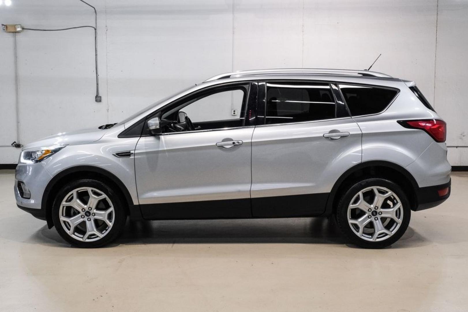 2019 Ingot Silver /Black Ford Escape Titanium (1FMCU9J93KU) with an EcoBoost 2.0L I4 GTDi DOHC Turbocharged VCT engine, Automatic transmission, located at 15300 Midway Rd., Addison, TX, 75001, (972) 702-0011, 32.958321, -96.838074- Photo#9