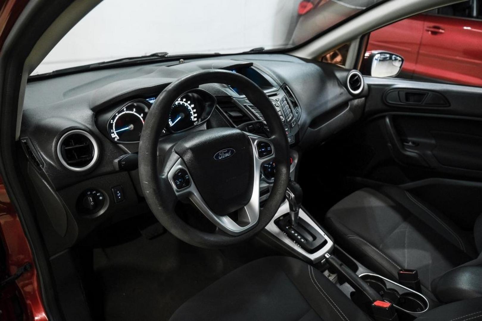 2017 Ruby Red Metallic /Black Ford Fiesta SE (3FADP4BJ4HM) with an 1.6L I4 Ti-VCT engine, Automatic transmission, located at 15300 Midway Rd., Addison, TX, 75001, (972) 702-0011, 32.958321, -96.838074- Photo#2