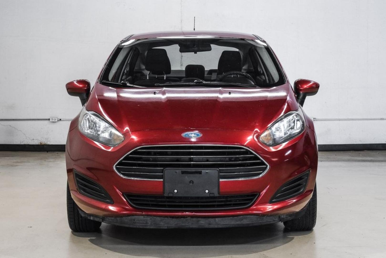 2017 Ruby Red Metallic /Black Ford Fiesta SE (3FADP4BJ4HM) with an 1.6L I4 Ti-VCT engine, Automatic transmission, located at 15300 Midway Rd., Addison, TX, 75001, (972) 702-0011, 32.958321, -96.838074- Photo#6