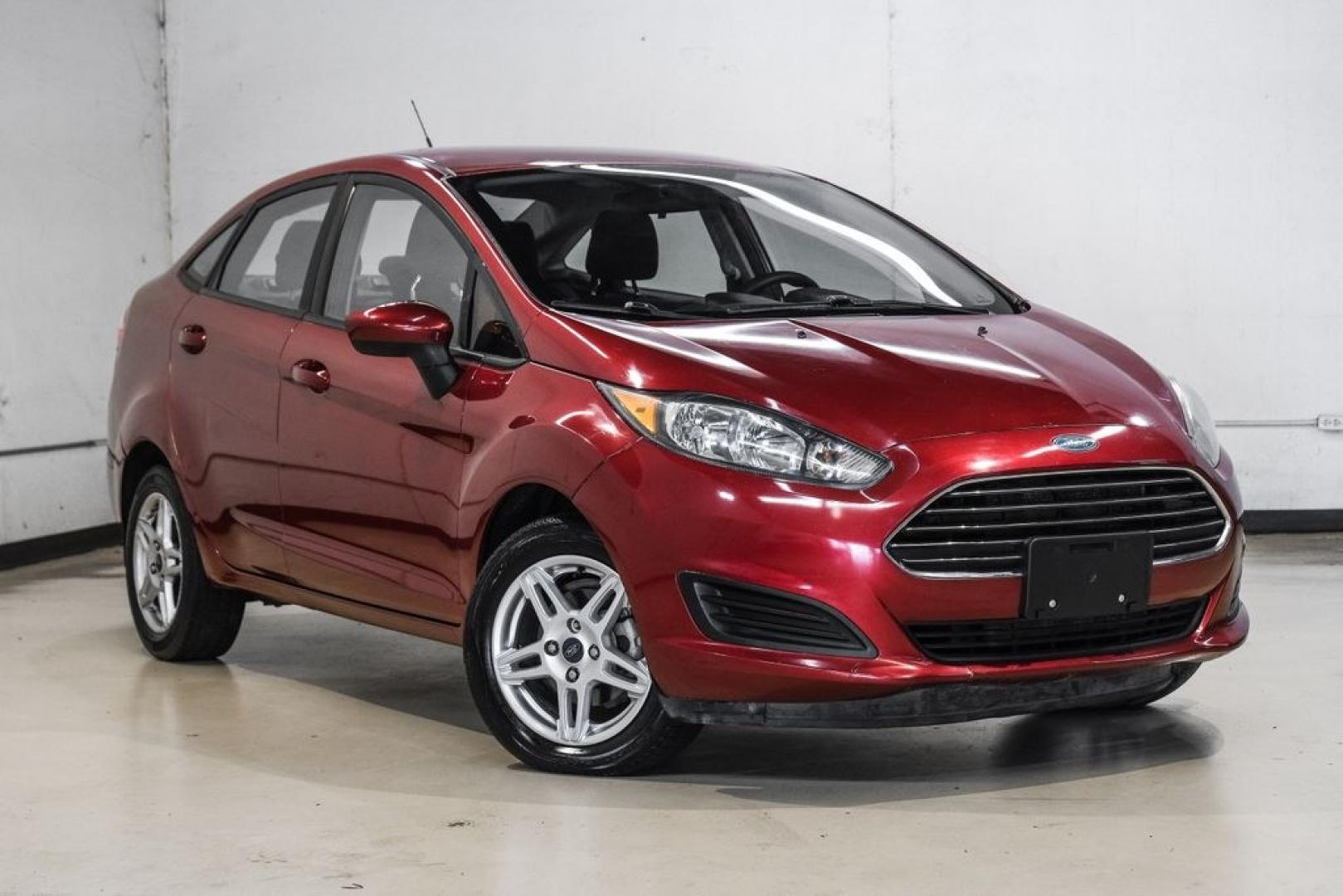 2017 Ruby Red Metallic /Black Ford Fiesta SE (3FADP4BJ4HM) with an 1.6L I4 Ti-VCT engine, Automatic transmission, located at 15300 Midway Rd., Addison, TX, 75001, (972) 702-0011, 32.958321, -96.838074- Photo#7