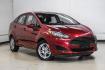 2017 Ruby Red Metallic /Black Ford Fiesta SE (3FADP4BJ4HM) with an 1.6L I4 Ti-VCT engine, Automatic transmission, located at 15300 Midway Rd., Addison, TX, 75001, (972) 702-0011, 32.958321, -96.838074- Photo#7