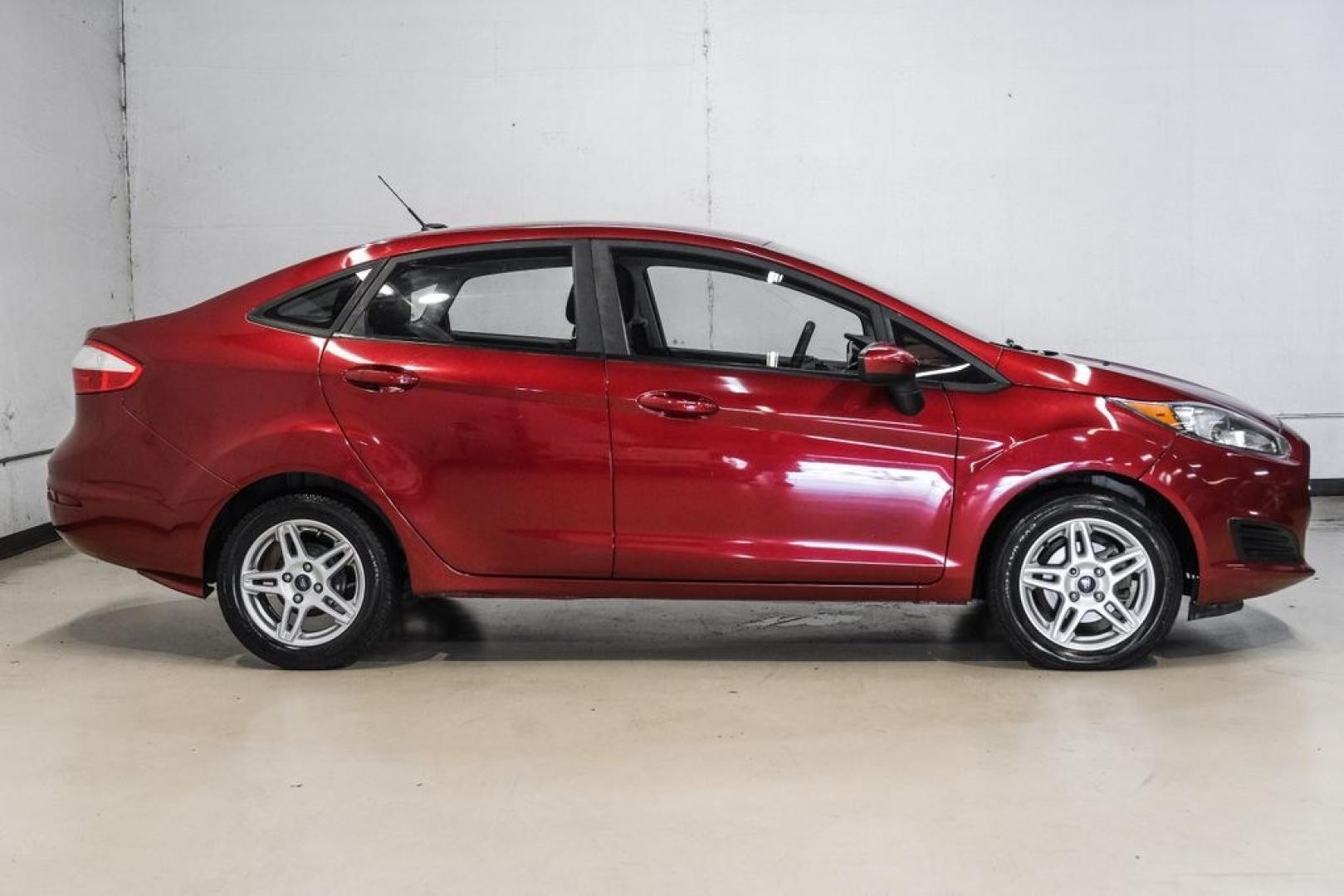 2017 Ruby Red Metallic /Black Ford Fiesta SE (3FADP4BJ4HM) with an 1.6L I4 Ti-VCT engine, Automatic transmission, located at 15300 Midway Rd., Addison, TX, 75001, (972) 702-0011, 32.958321, -96.838074- Photo#8