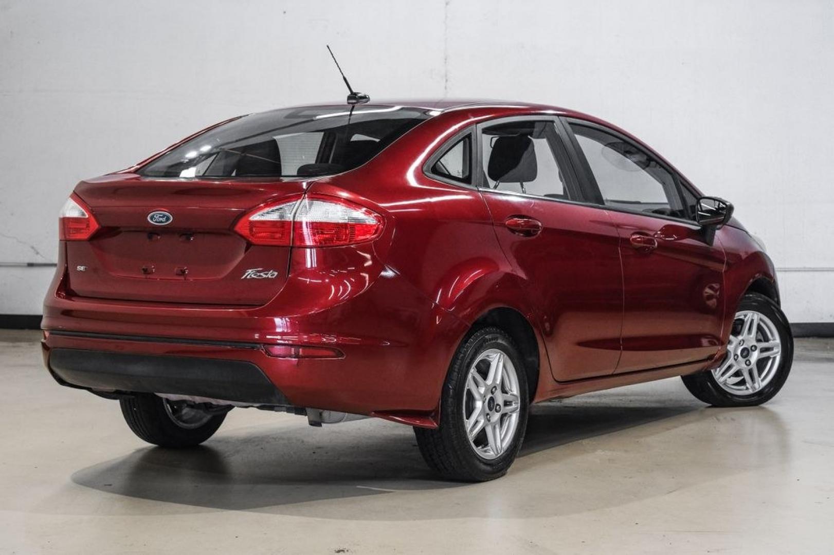 2017 Ruby Red Metallic /Black Ford Fiesta SE (3FADP4BJ4HM) with an 1.6L I4 Ti-VCT engine, Automatic transmission, located at 15300 Midway Rd., Addison, TX, 75001, (972) 702-0011, 32.958321, -96.838074- Photo#9