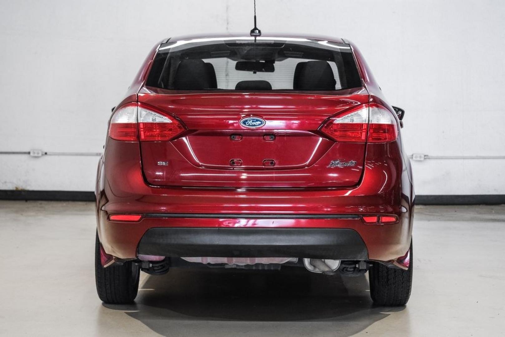 2017 Ruby Red Metallic /Black Ford Fiesta SE (3FADP4BJ4HM) with an 1.6L I4 Ti-VCT engine, Automatic transmission, located at 15300 Midway Rd., Addison, TX, 75001, (972) 702-0011, 32.958321, -96.838074- Photo#10