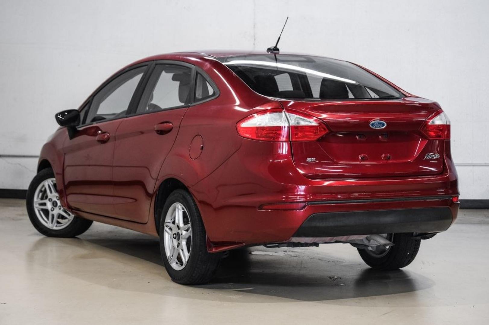 2017 Ruby Red Metallic /Black Ford Fiesta SE (3FADP4BJ4HM) with an 1.6L I4 Ti-VCT engine, Automatic transmission, located at 15300 Midway Rd., Addison, TX, 75001, (972) 702-0011, 32.958321, -96.838074- Photo#11