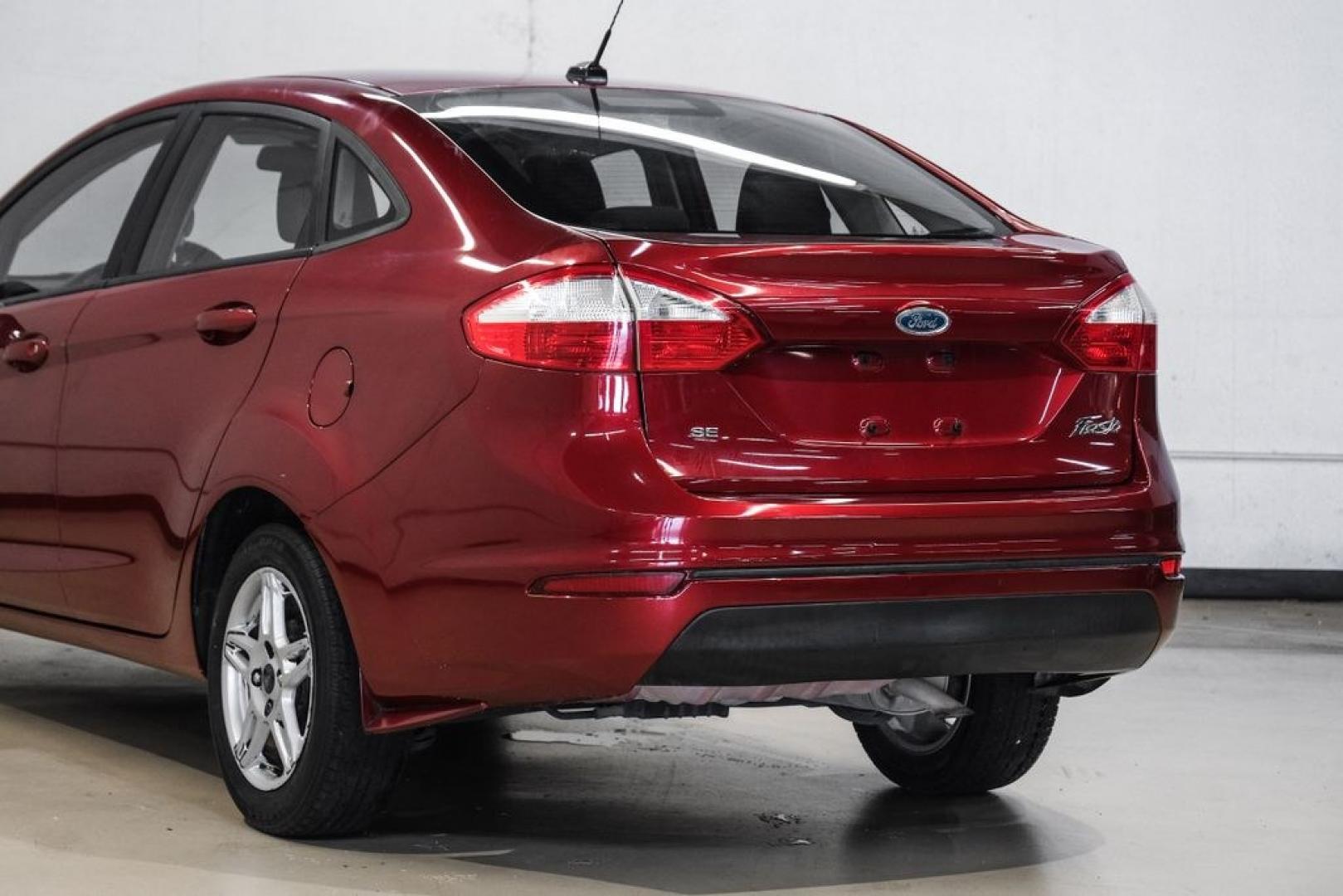 2017 Ruby Red Metallic /Black Ford Fiesta SE (3FADP4BJ4HM) with an 1.6L I4 Ti-VCT engine, Automatic transmission, located at 15300 Midway Rd., Addison, TX, 75001, (972) 702-0011, 32.958321, -96.838074- Photo#13