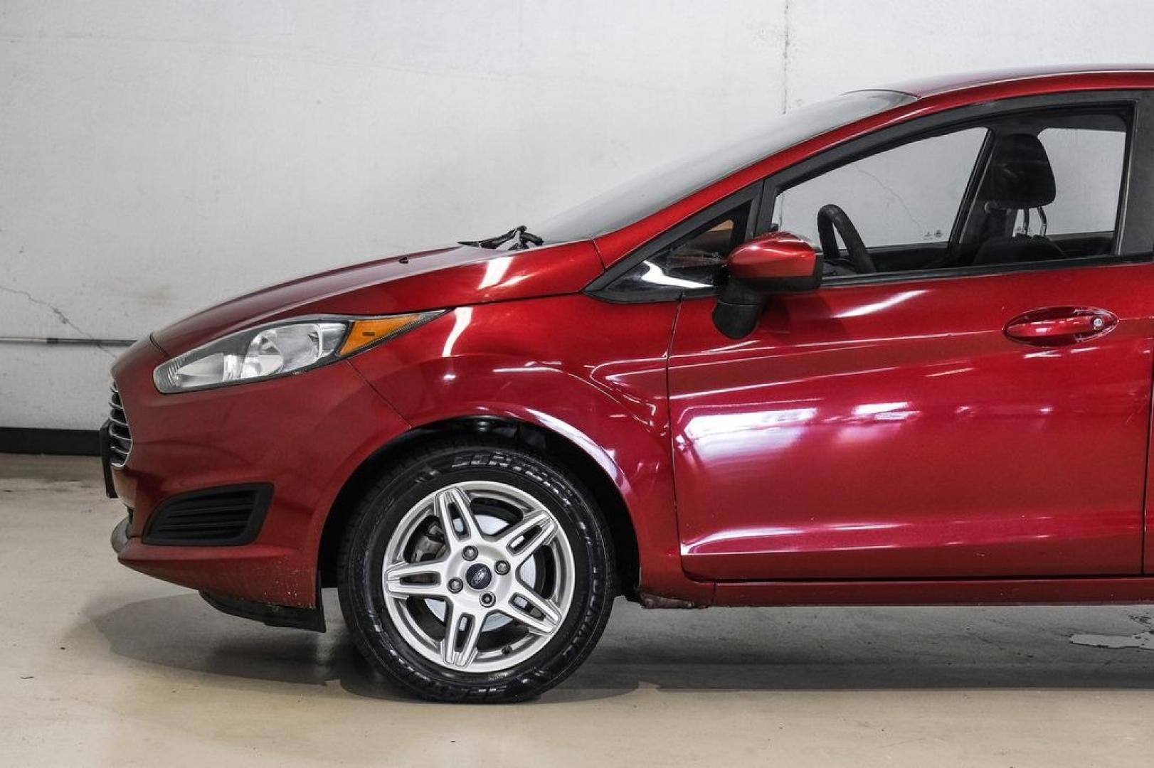 2017 Ruby Red Metallic /Black Ford Fiesta SE (3FADP4BJ4HM) with an 1.6L I4 Ti-VCT engine, Automatic transmission, located at 15300 Midway Rd., Addison, TX, 75001, (972) 702-0011, 32.958321, -96.838074- Photo#15