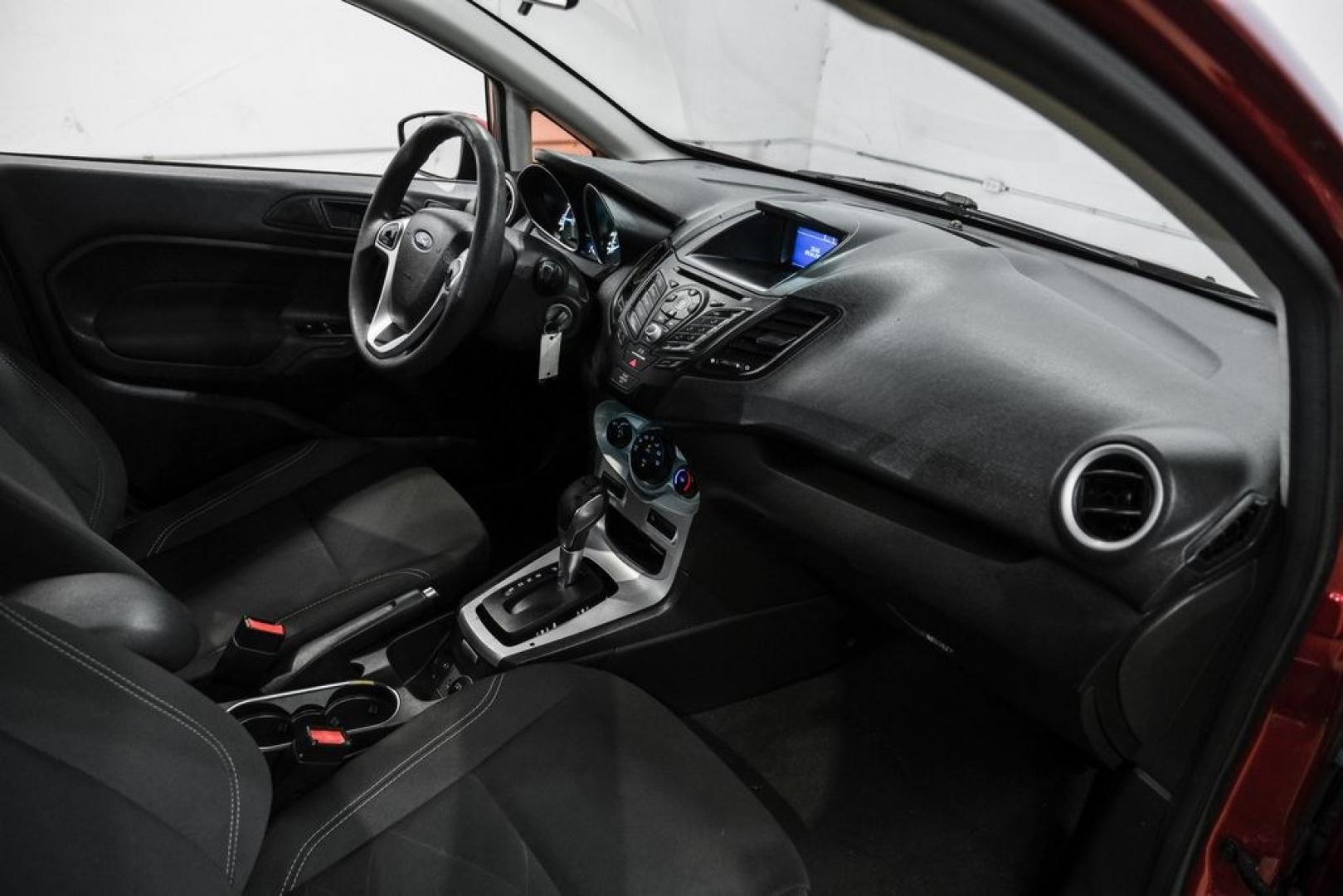 2017 Ruby Red Metallic /Black Ford Fiesta SE (3FADP4BJ4HM) with an 1.6L I4 Ti-VCT engine, Automatic transmission, located at 15300 Midway Rd., Addison, TX, 75001, (972) 702-0011, 32.958321, -96.838074- Photo#17