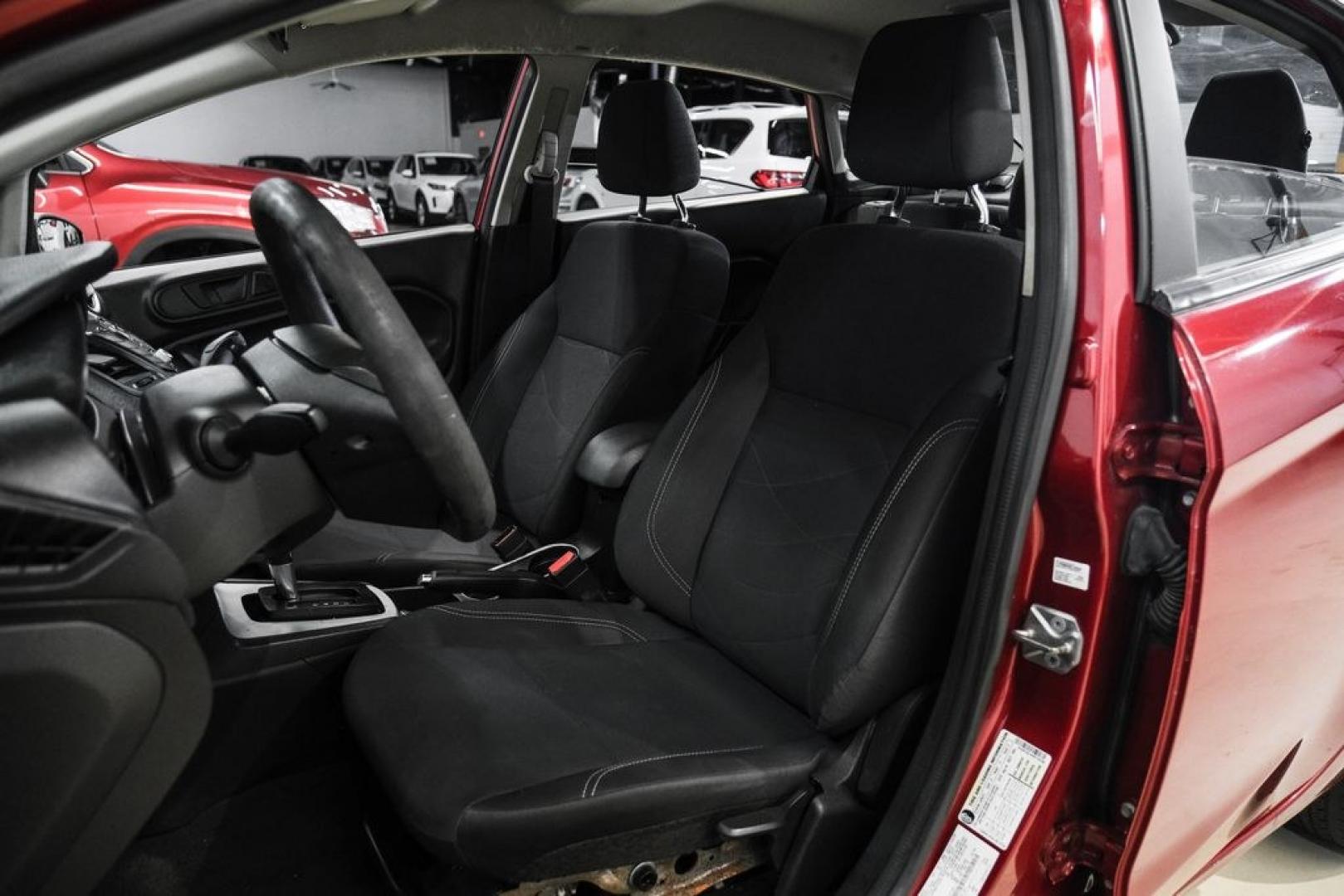 2017 Ruby Red Metallic /Black Ford Fiesta SE (3FADP4BJ4HM) with an 1.6L I4 Ti-VCT engine, Automatic transmission, located at 15300 Midway Rd., Addison, TX, 75001, (972) 702-0011, 32.958321, -96.838074- Photo#31