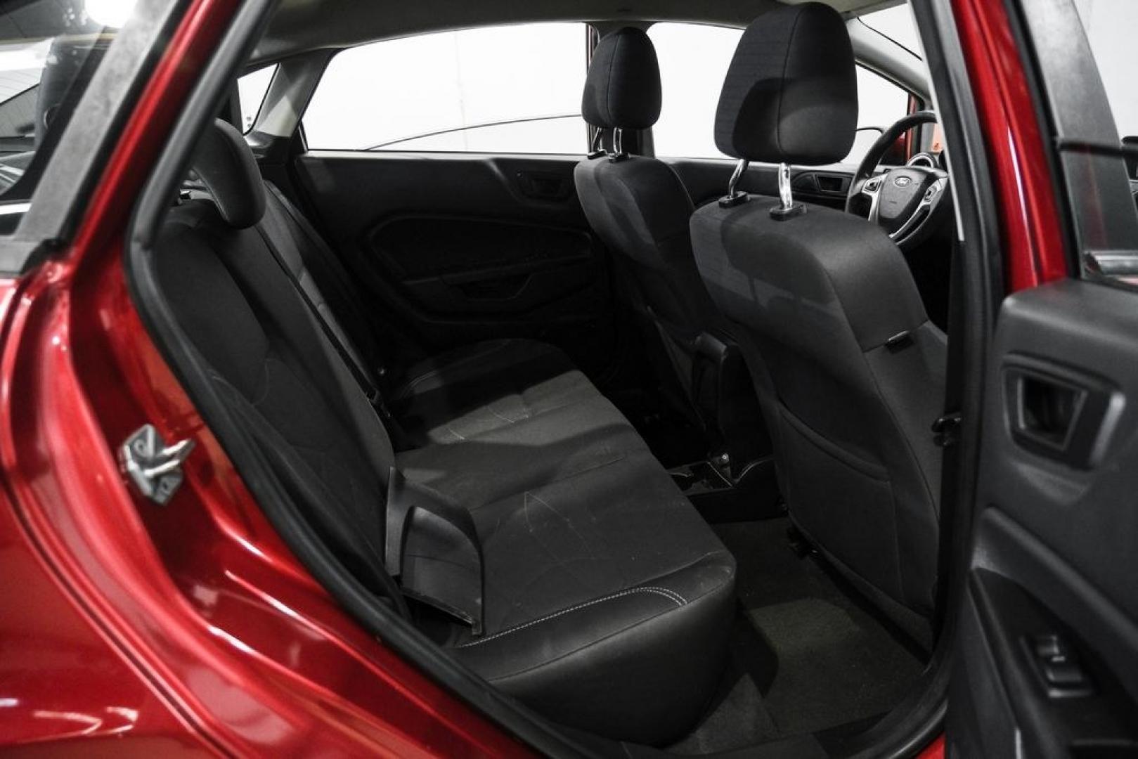 2017 Ruby Red Metallic /Black Ford Fiesta SE (3FADP4BJ4HM) with an 1.6L I4 Ti-VCT engine, Automatic transmission, located at 15300 Midway Rd., Addison, TX, 75001, (972) 702-0011, 32.958321, -96.838074- Photo#35