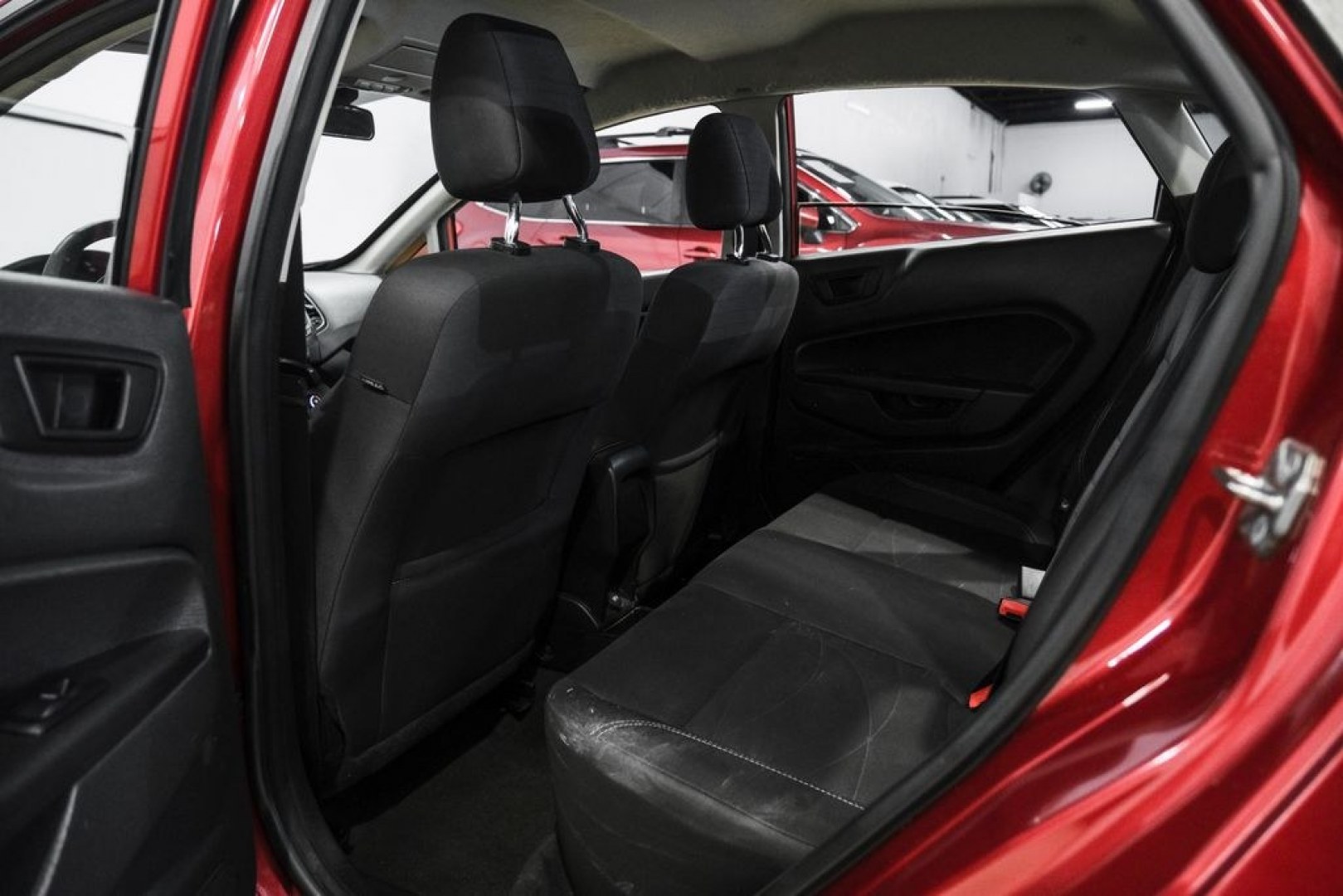 2017 Ruby Red Metallic /Black Ford Fiesta SE (3FADP4BJ4HM) with an 1.6L I4 Ti-VCT engine, Automatic transmission, located at 15300 Midway Rd., Addison, TX, 75001, (972) 702-0011, 32.958321, -96.838074- Photo#36