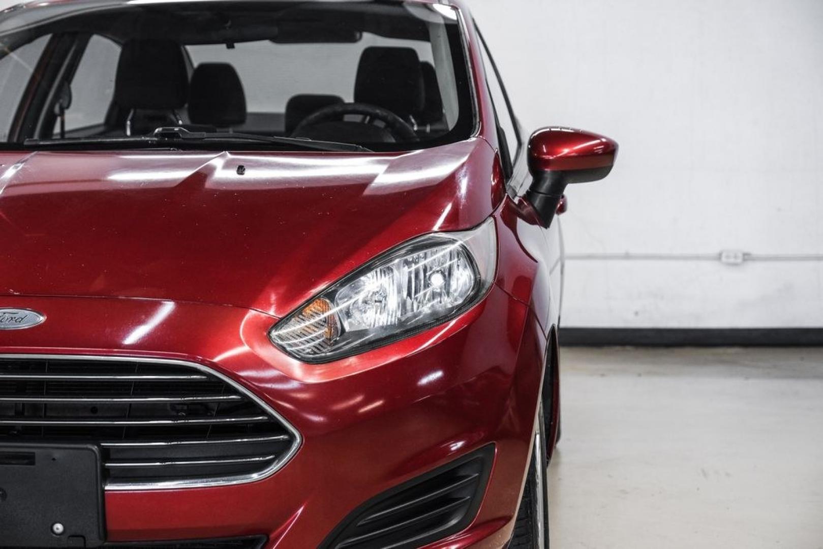 2017 Ruby Red Metallic /Black Ford Fiesta SE (3FADP4BJ4HM) with an 1.6L I4 Ti-VCT engine, Automatic transmission, located at 15300 Midway Rd., Addison, TX, 75001, (972) 702-0011, 32.958321, -96.838074- Photo#45