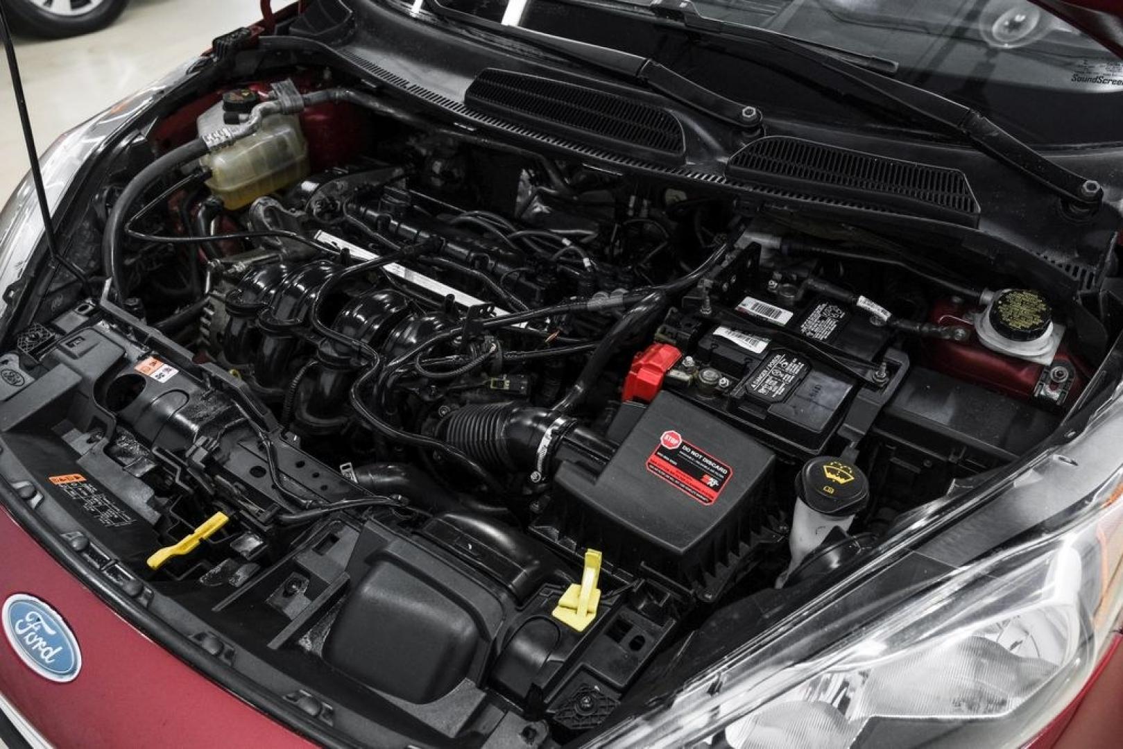 2017 Ruby Red Metallic /Black Ford Fiesta SE (3FADP4BJ4HM) with an 1.6L I4 Ti-VCT engine, Automatic transmission, located at 15300 Midway Rd., Addison, TX, 75001, (972) 702-0011, 32.958321, -96.838074- Photo#47