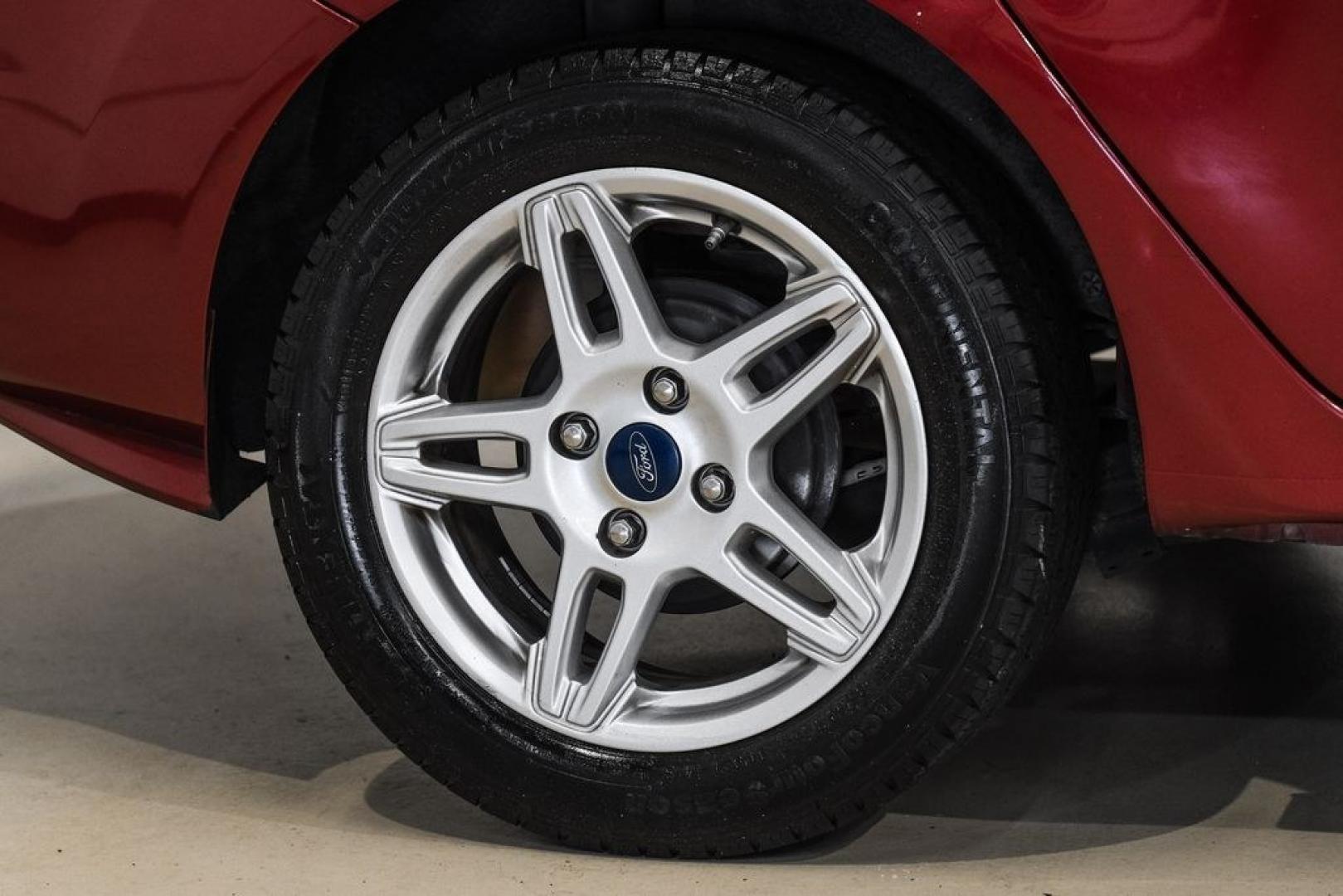 2017 Ruby Red Metallic /Black Ford Fiesta SE (3FADP4BJ4HM) with an 1.6L I4 Ti-VCT engine, Automatic transmission, located at 15300 Midway Rd., Addison, TX, 75001, (972) 702-0011, 32.958321, -96.838074- Photo#54