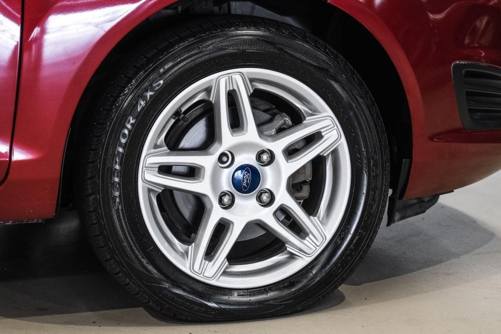 2017 Ruby Red Metallic /Black Ford Fiesta SE (3FADP4BJ4HM) with an 1.6L I4 Ti-VCT engine, Automatic transmission, located at 15300 Midway Rd., Addison, TX, 75001, (972) 702-0011, 32.958321, -96.838074- Photo#55