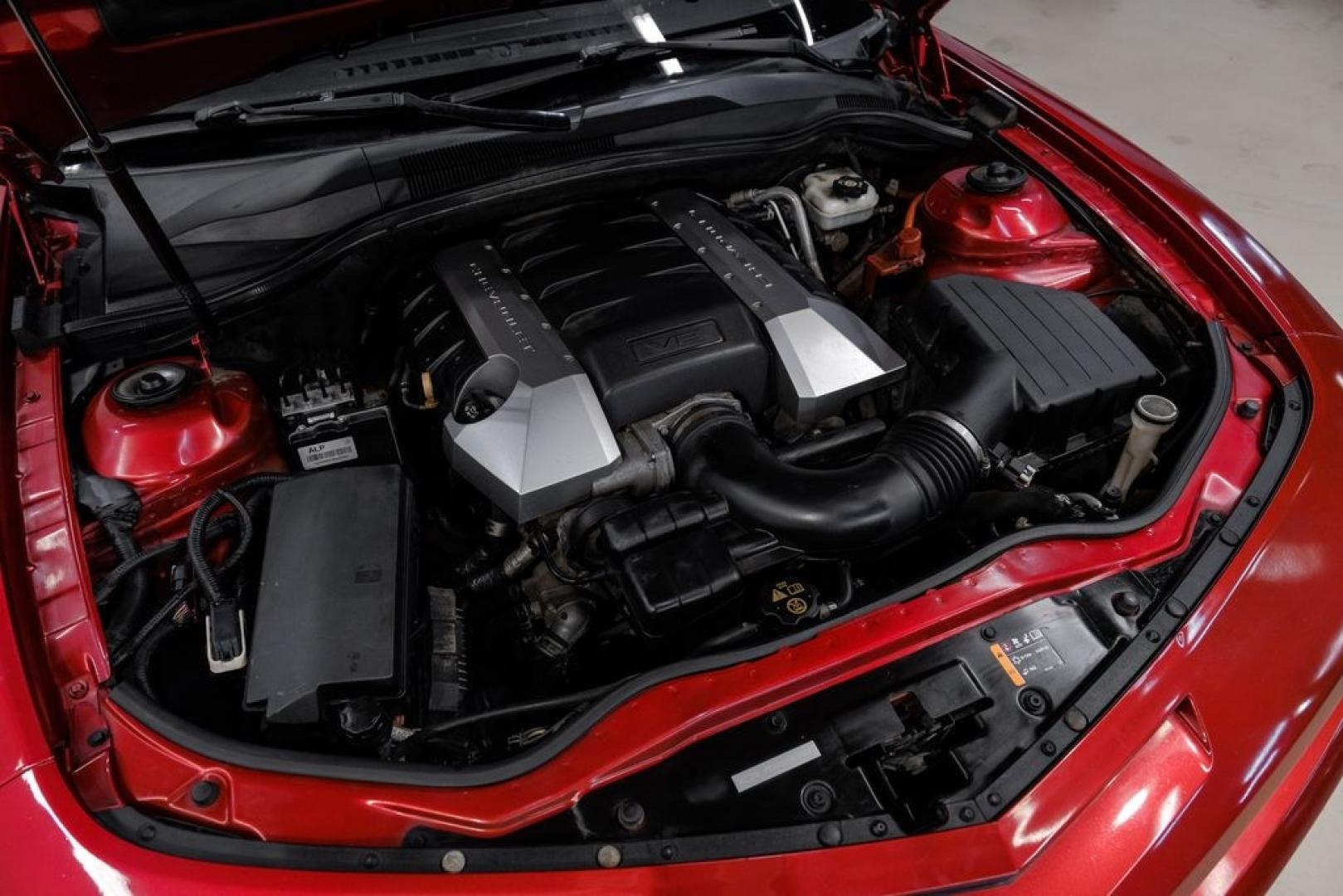2013 Crystal Red Tint /Gray Chevrolet Camaro SS (2G1FJ1EJ9D9) with an 6.2L V8 SFI engine, Automatic transmission, located at 15300 Midway Rd., Addison, TX, 75001, (972) 702-0011, 32.958321, -96.838074- Photo#46